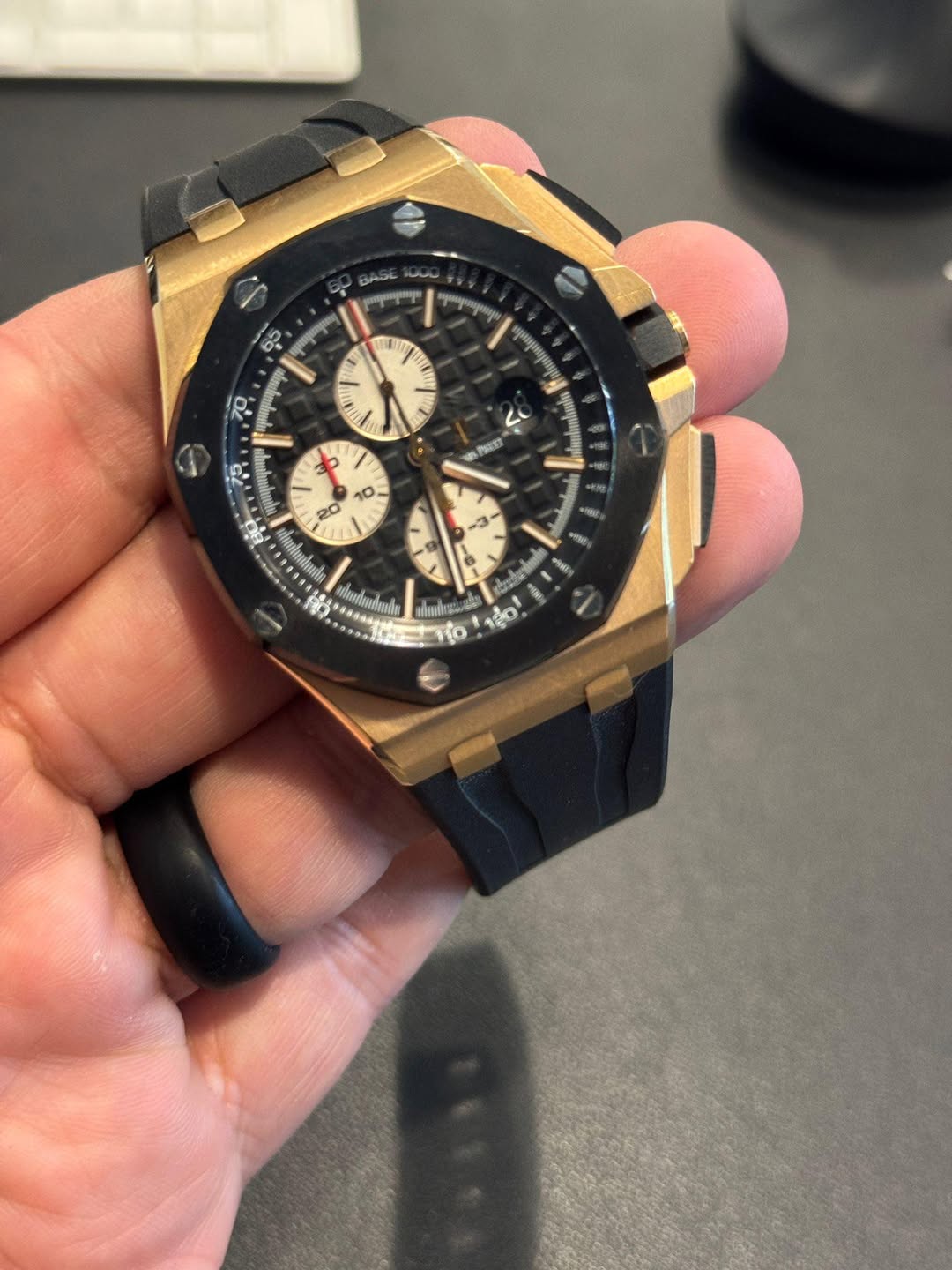 May be an image of wrist watch and text