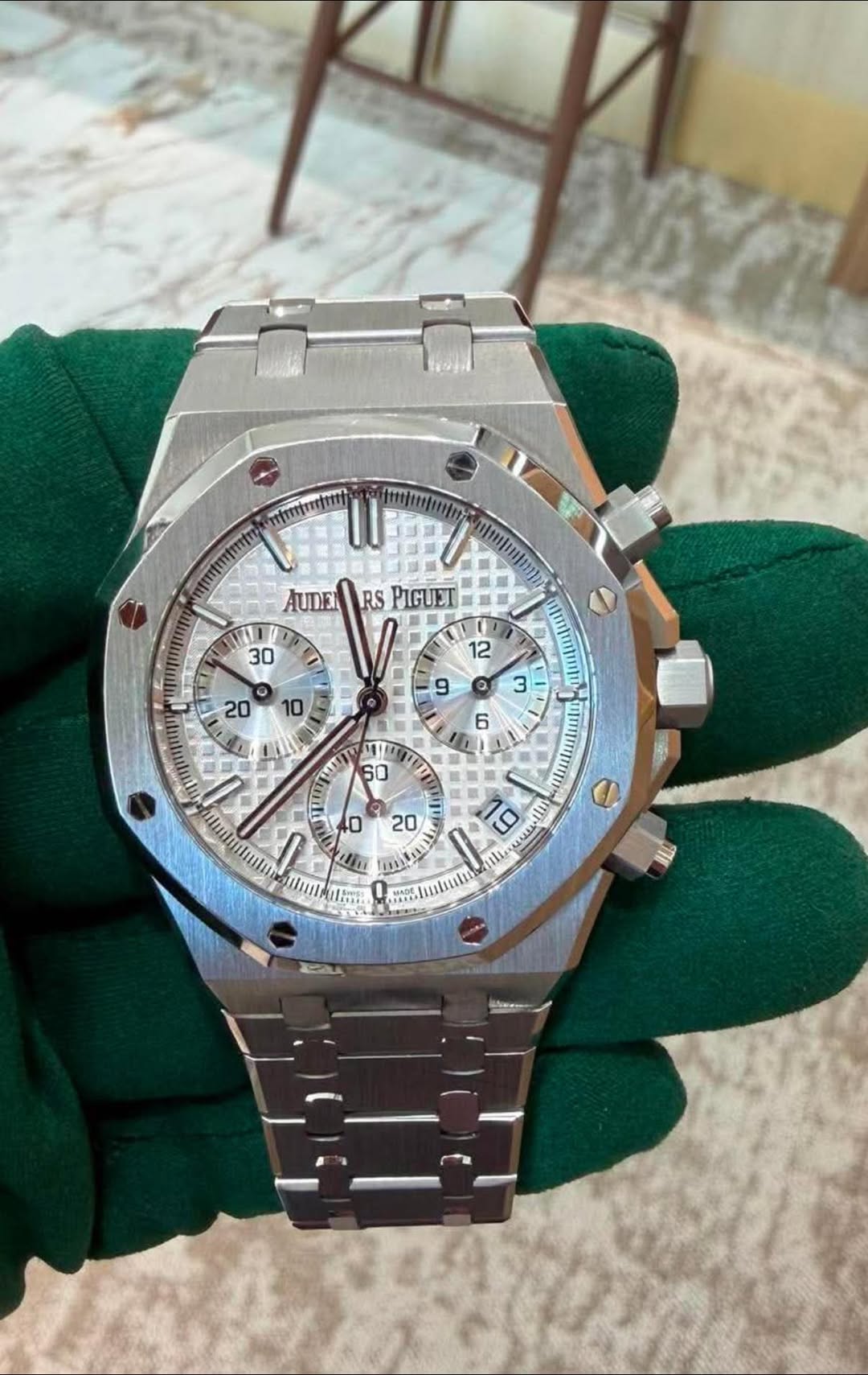 May be an image of wrist watch and text