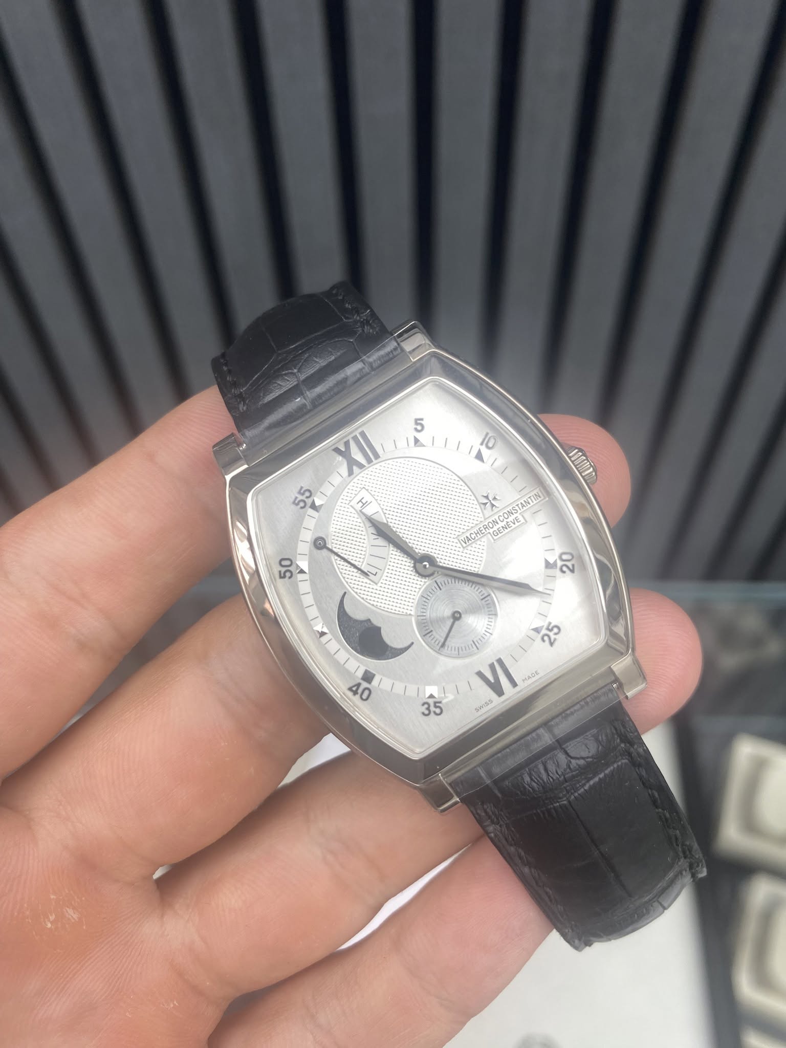 May be an image of wrist watch and text
