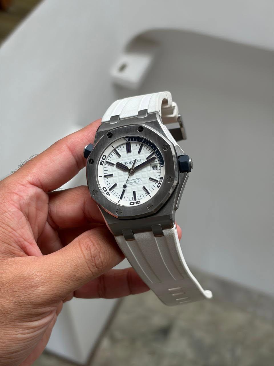 May be an image of wrist watch and text