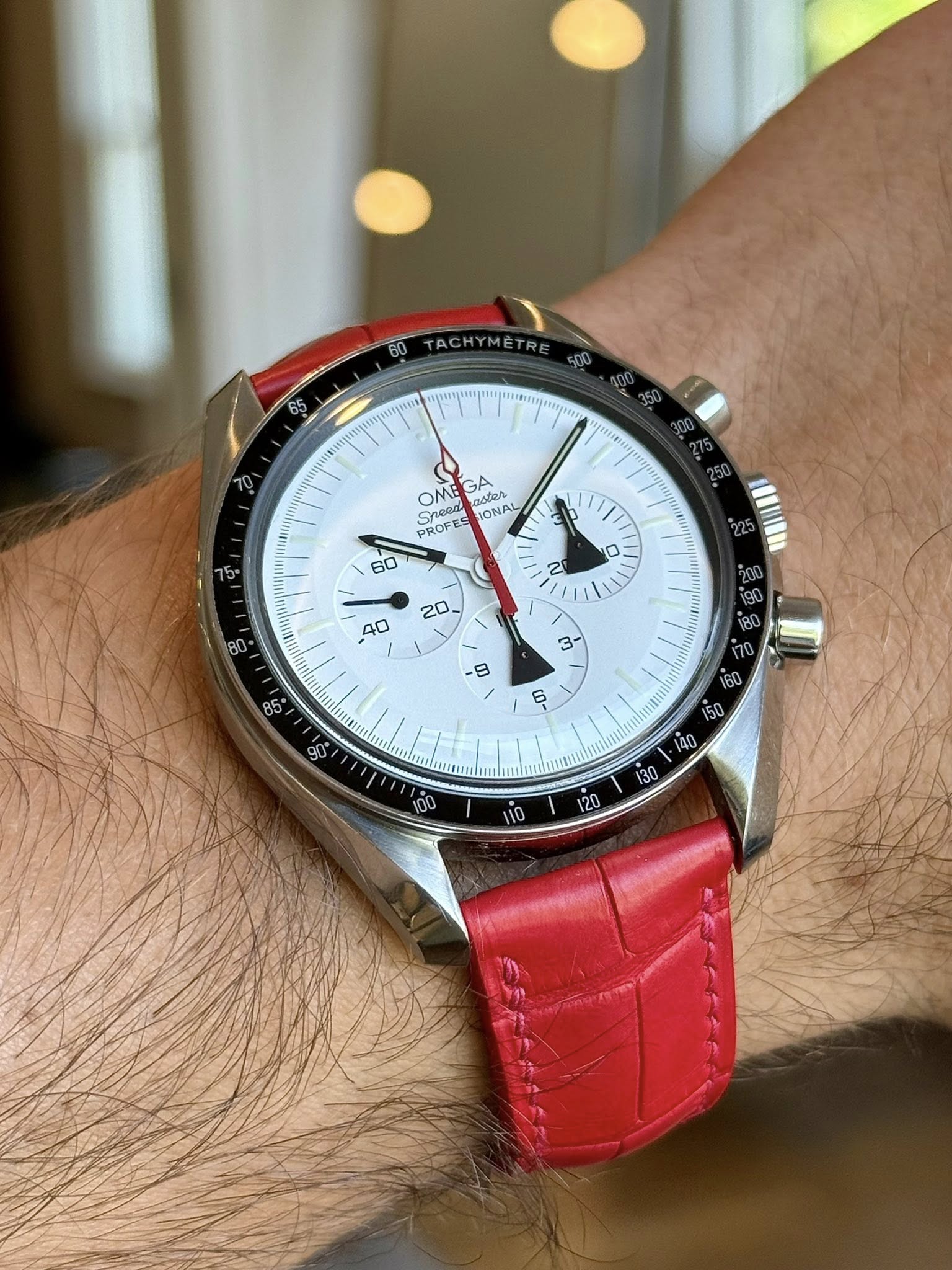 May be an image of wrist watch and text