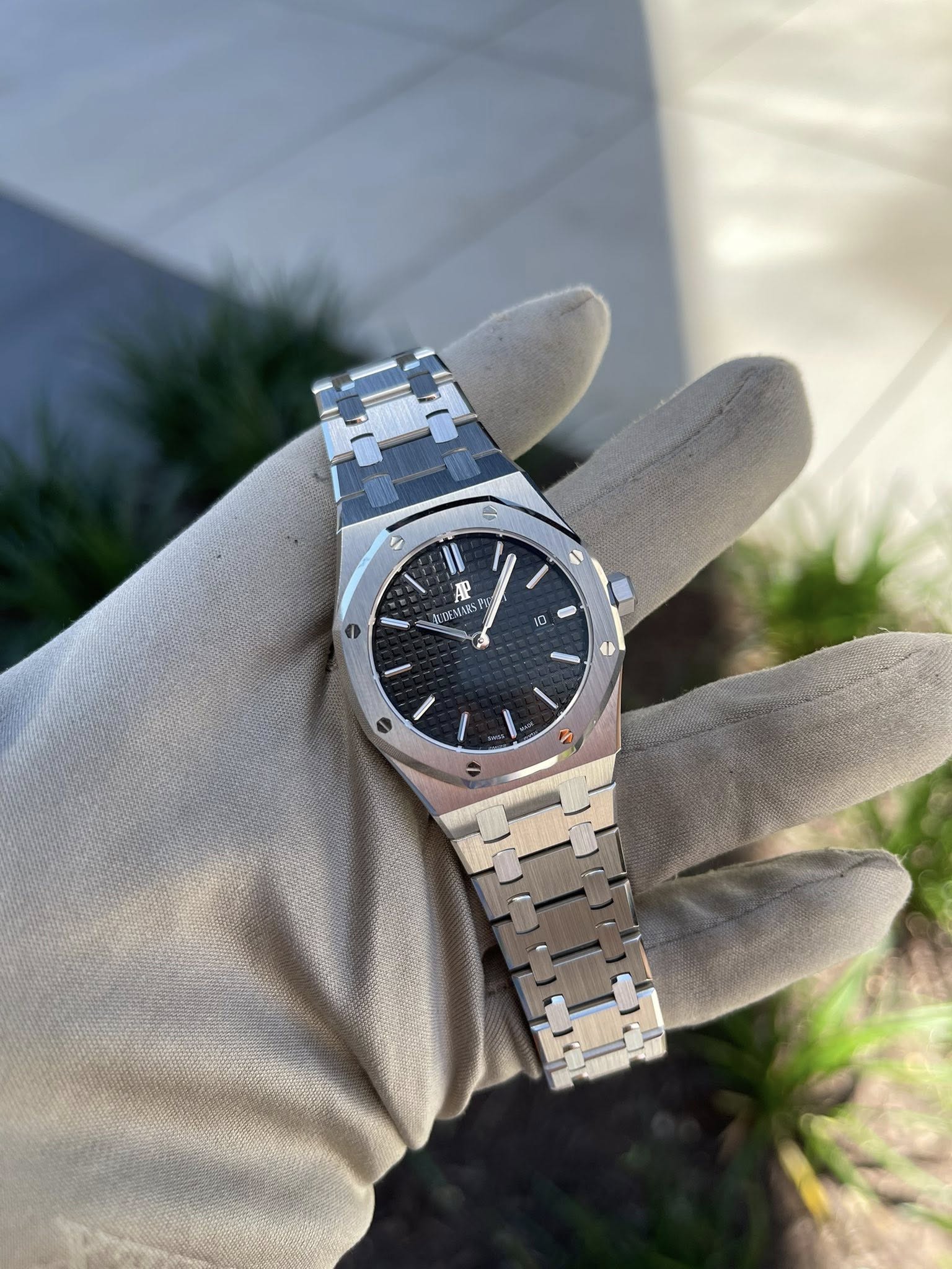 May be an image of wrist watch and text
