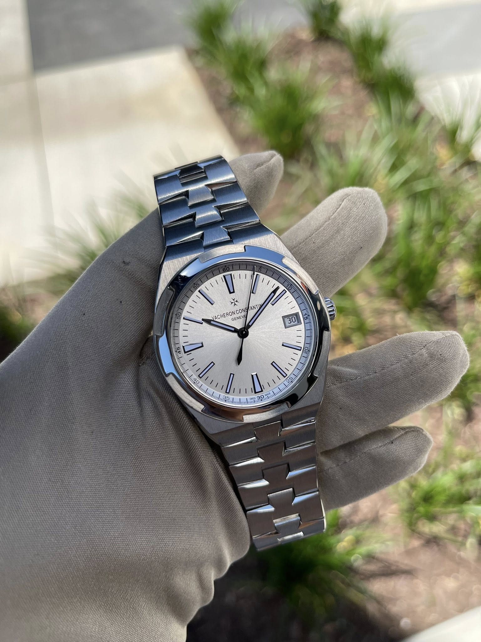 May be an image of wrist watch and text