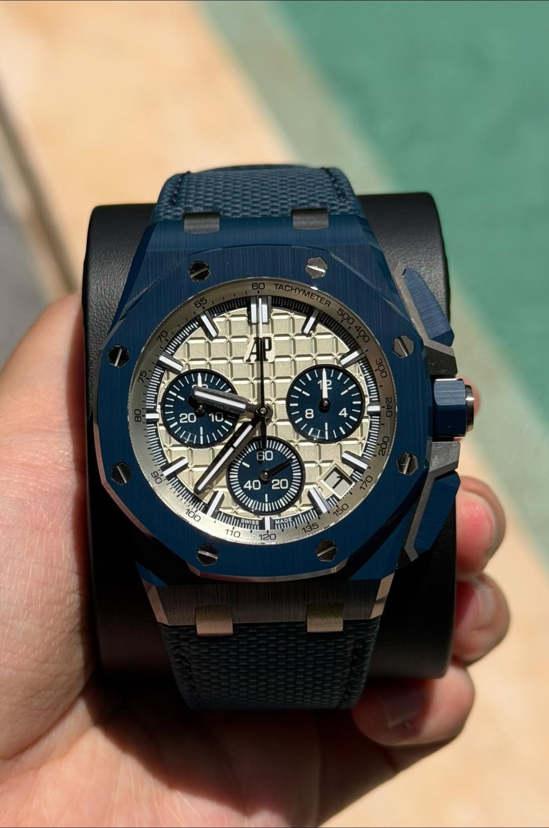 May be an image of wrist watch and text