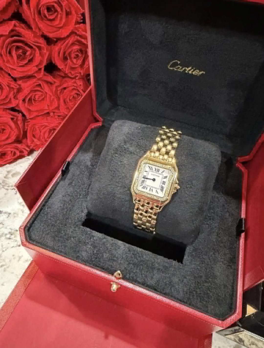 May be an image of wrist watch and text