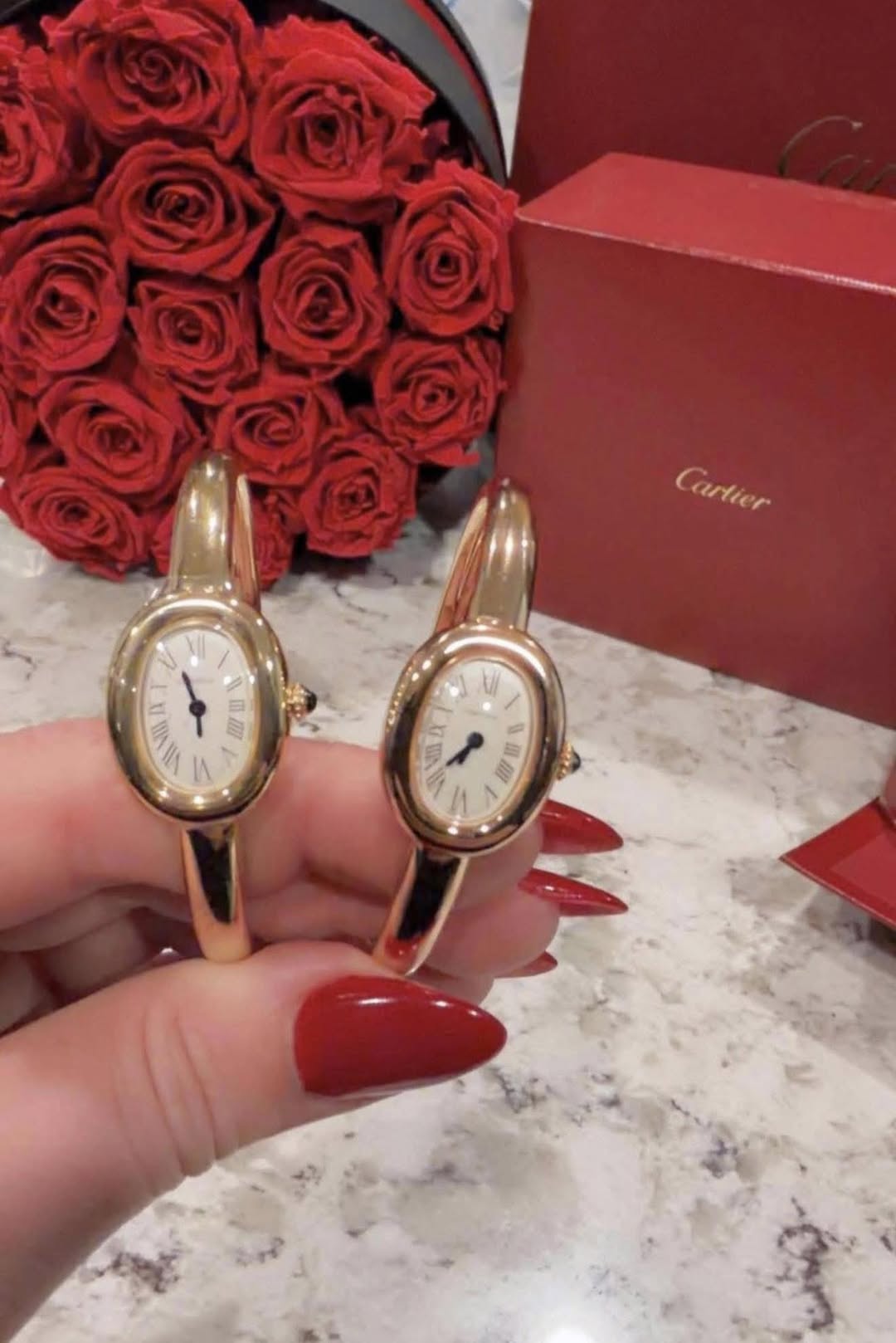 May be an image of wrist watch and text