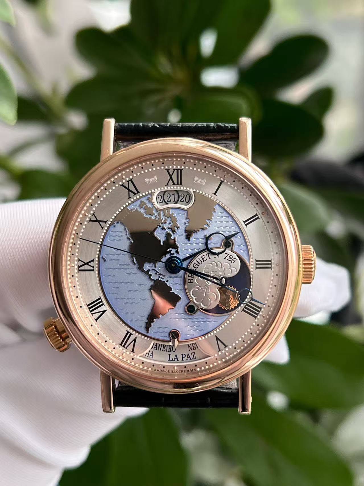 May be an image of map, wrist watch and text