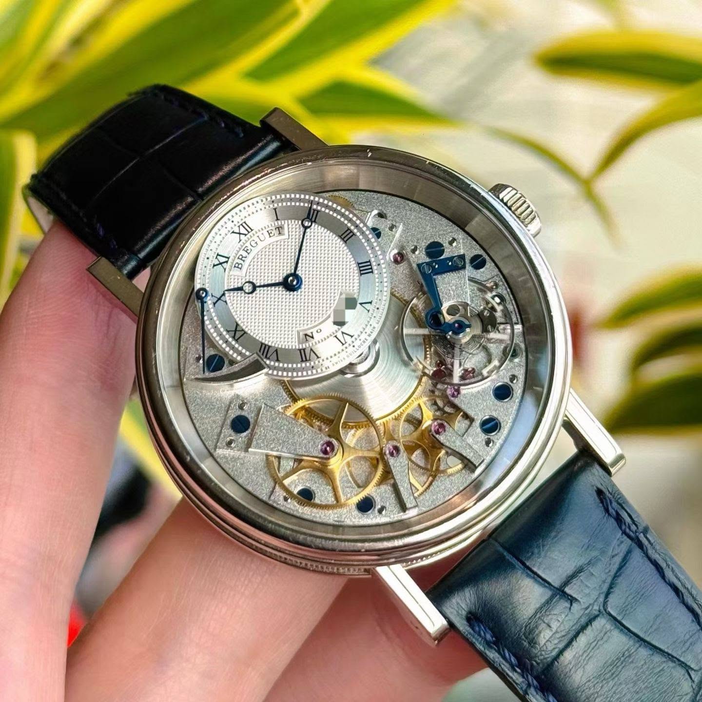 May be an image of wrist watch