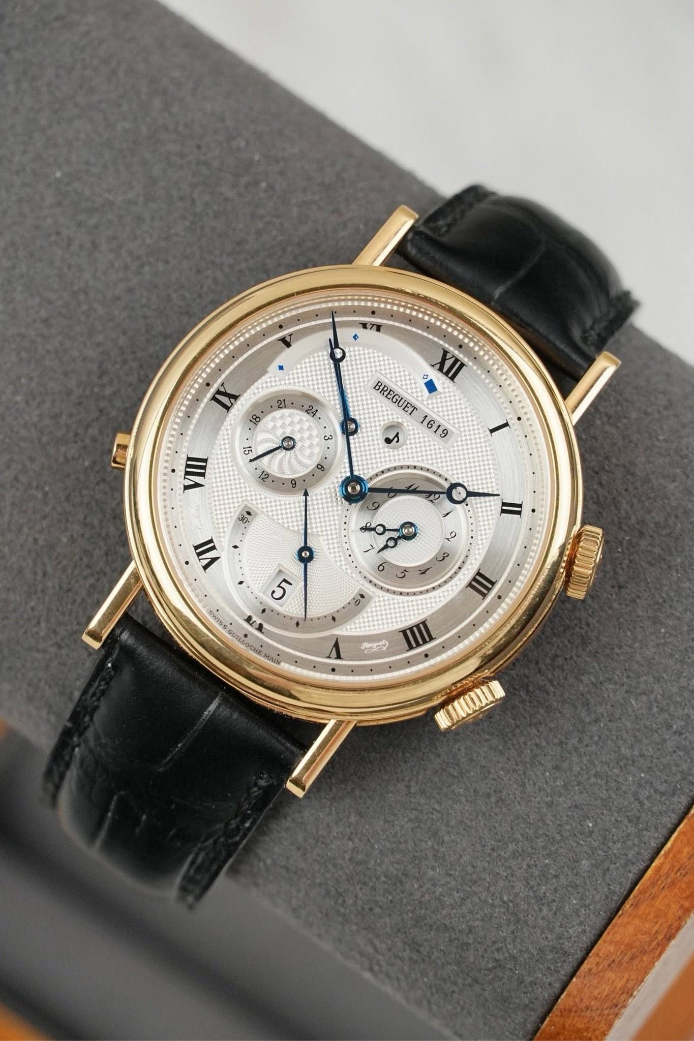 May be an image of wrist watch and text