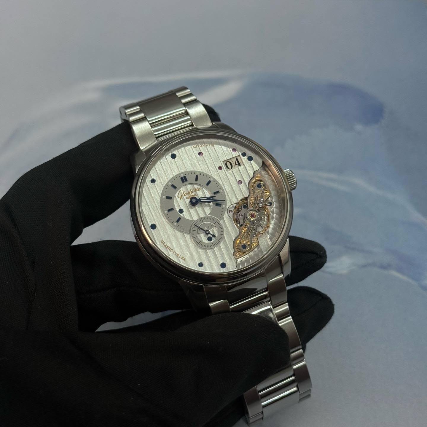 May be an image of wrist watch