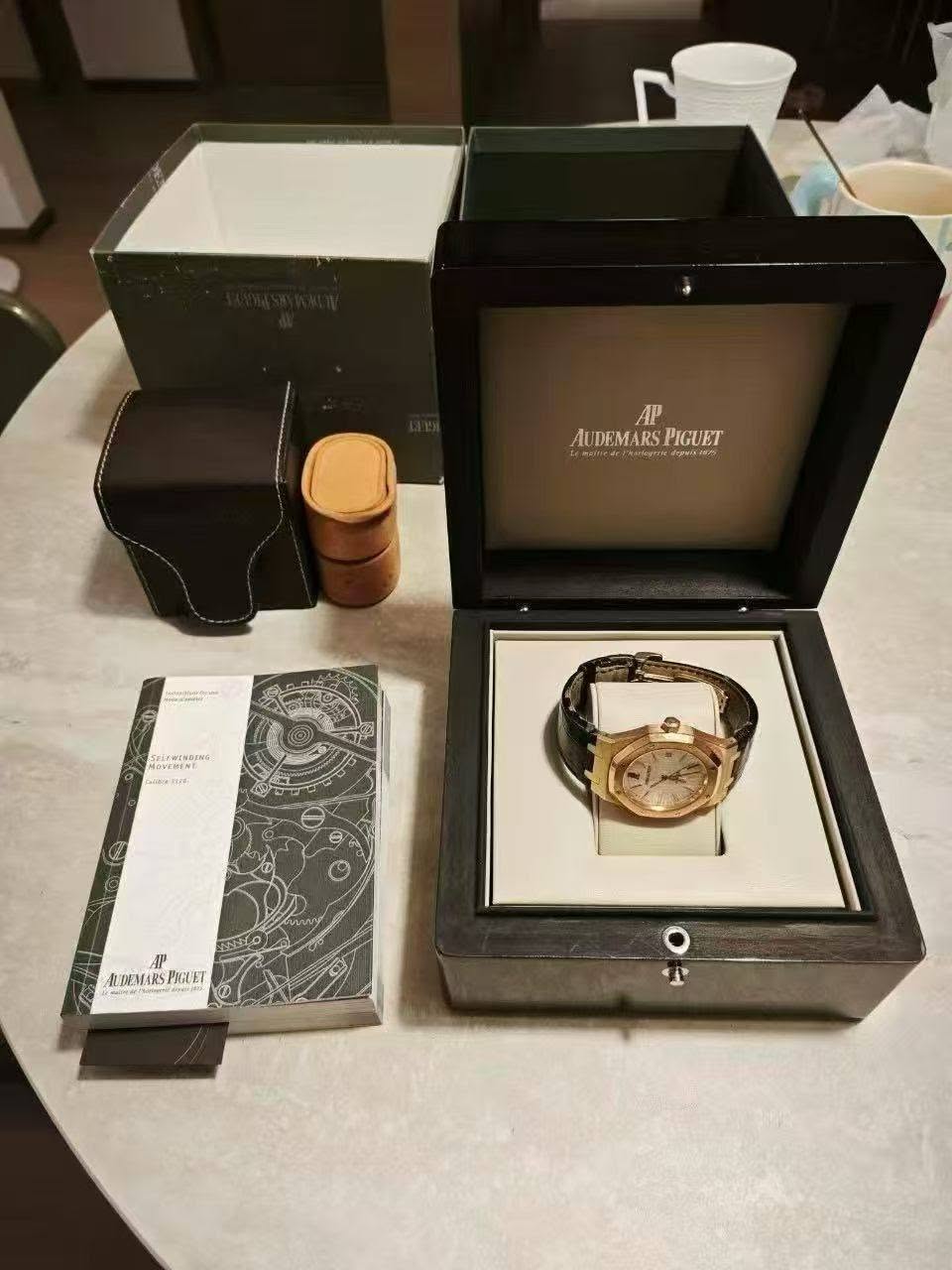 May be an image of wrist watch and text