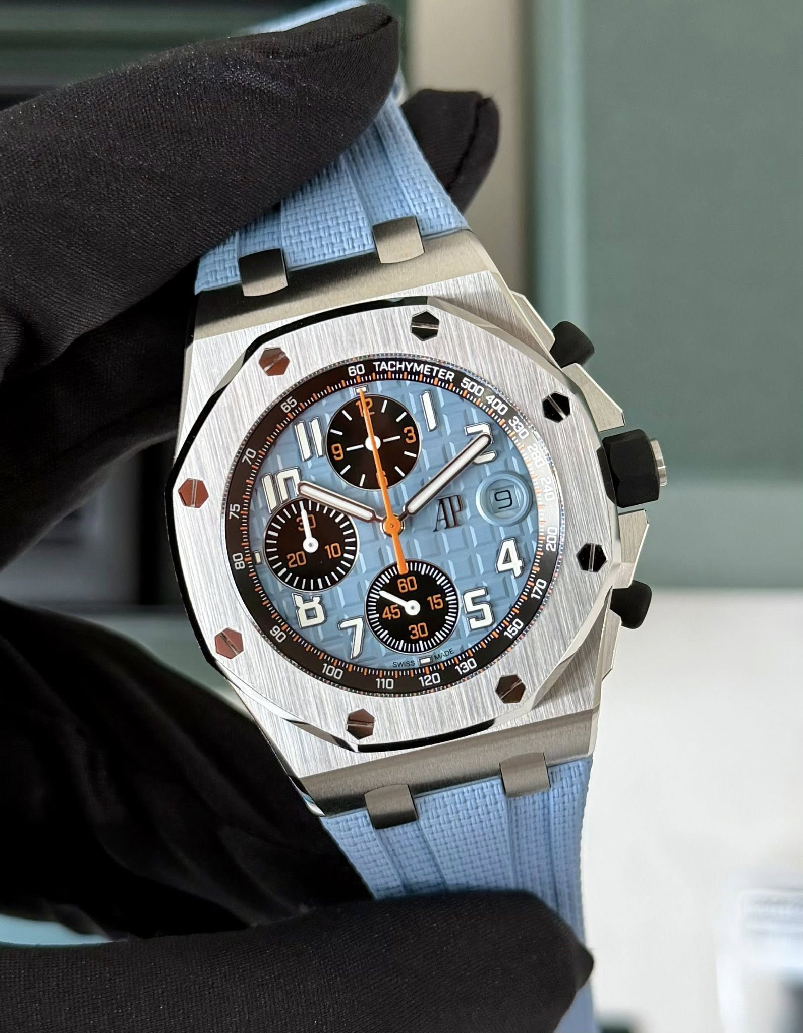 May be an image of wrist watch and text
