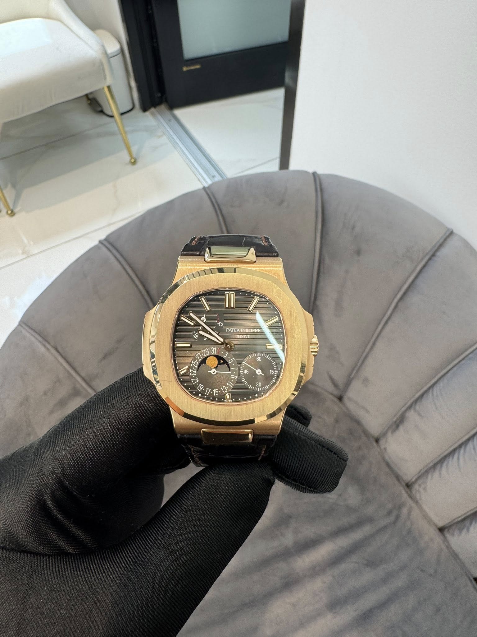 May be an image of wrist watch and text