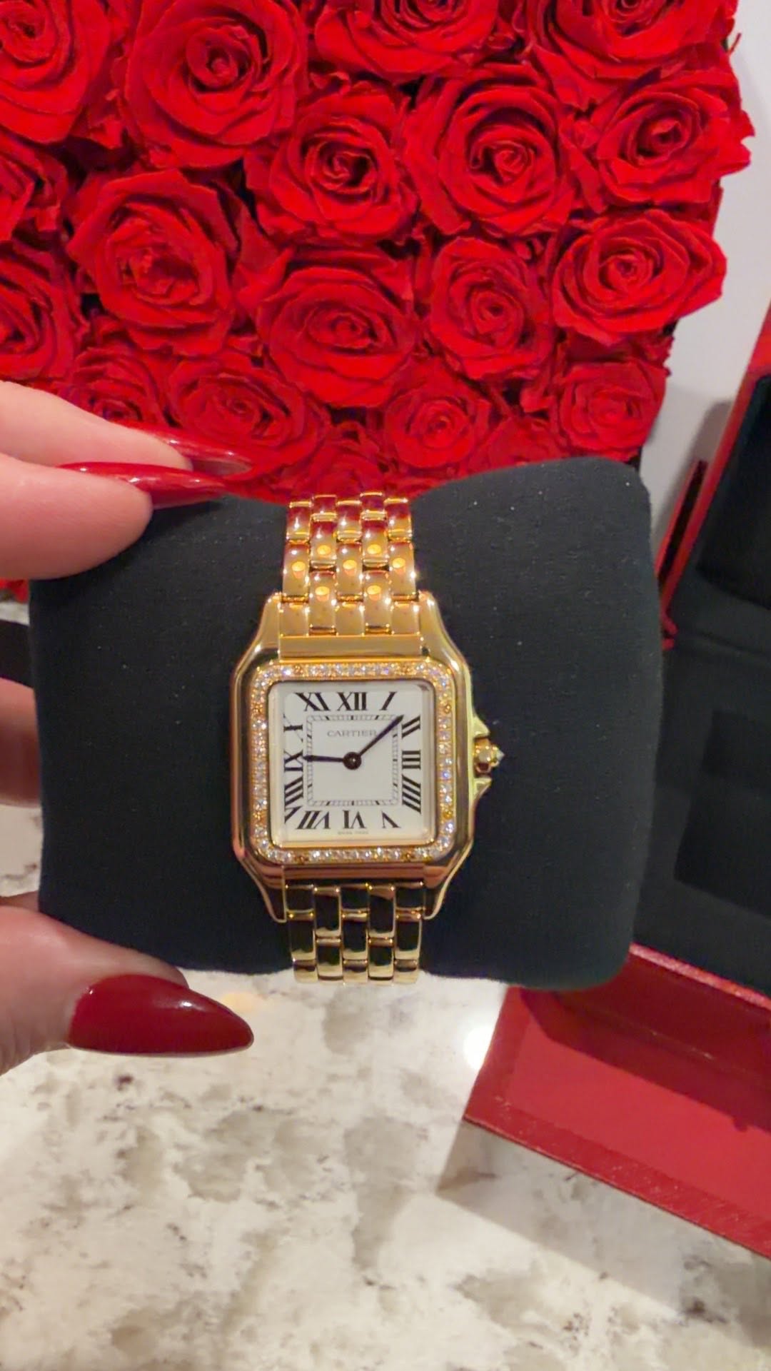 May be an image of wrist watch and text