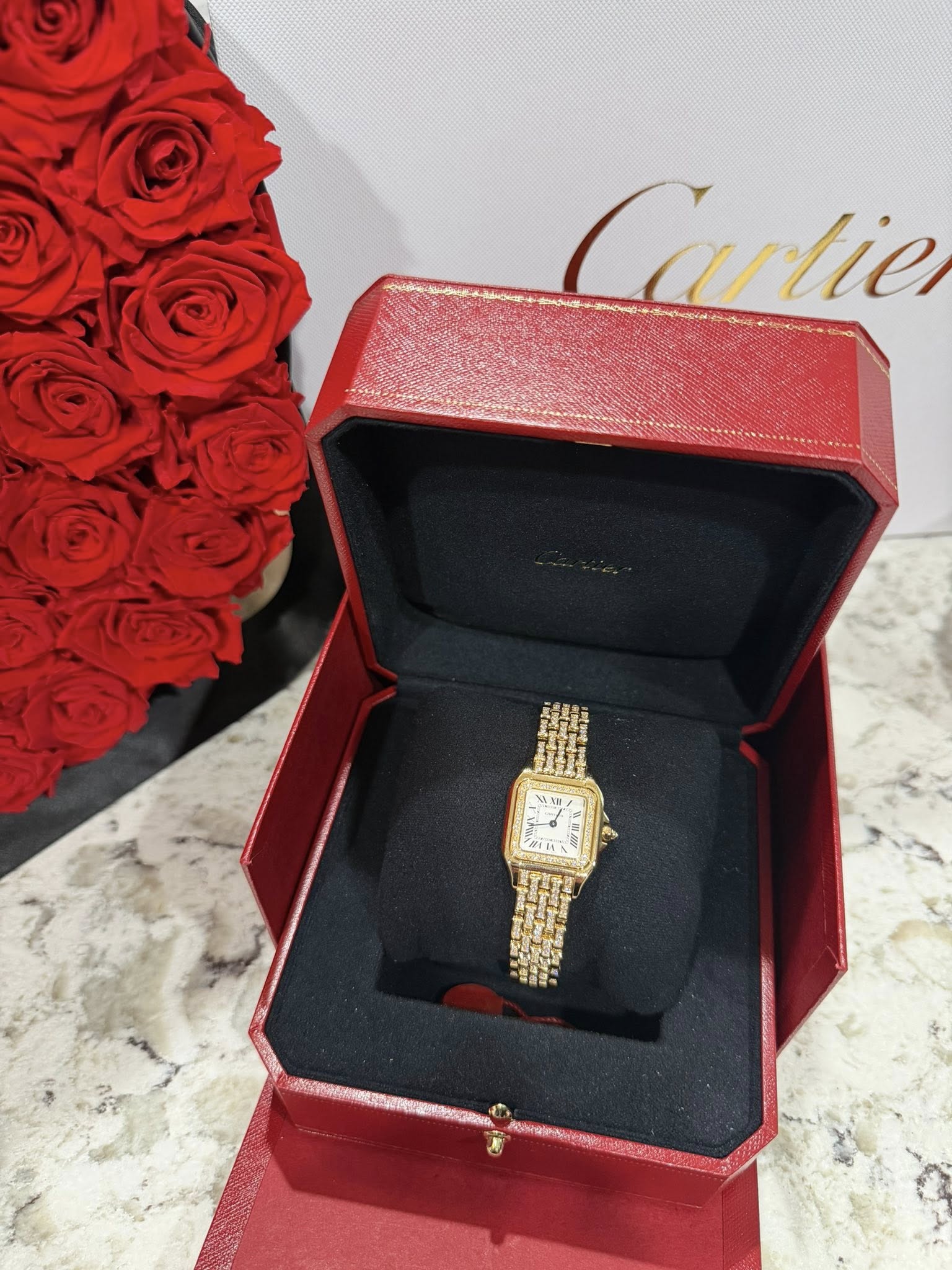 May be an image of wrist watch and text