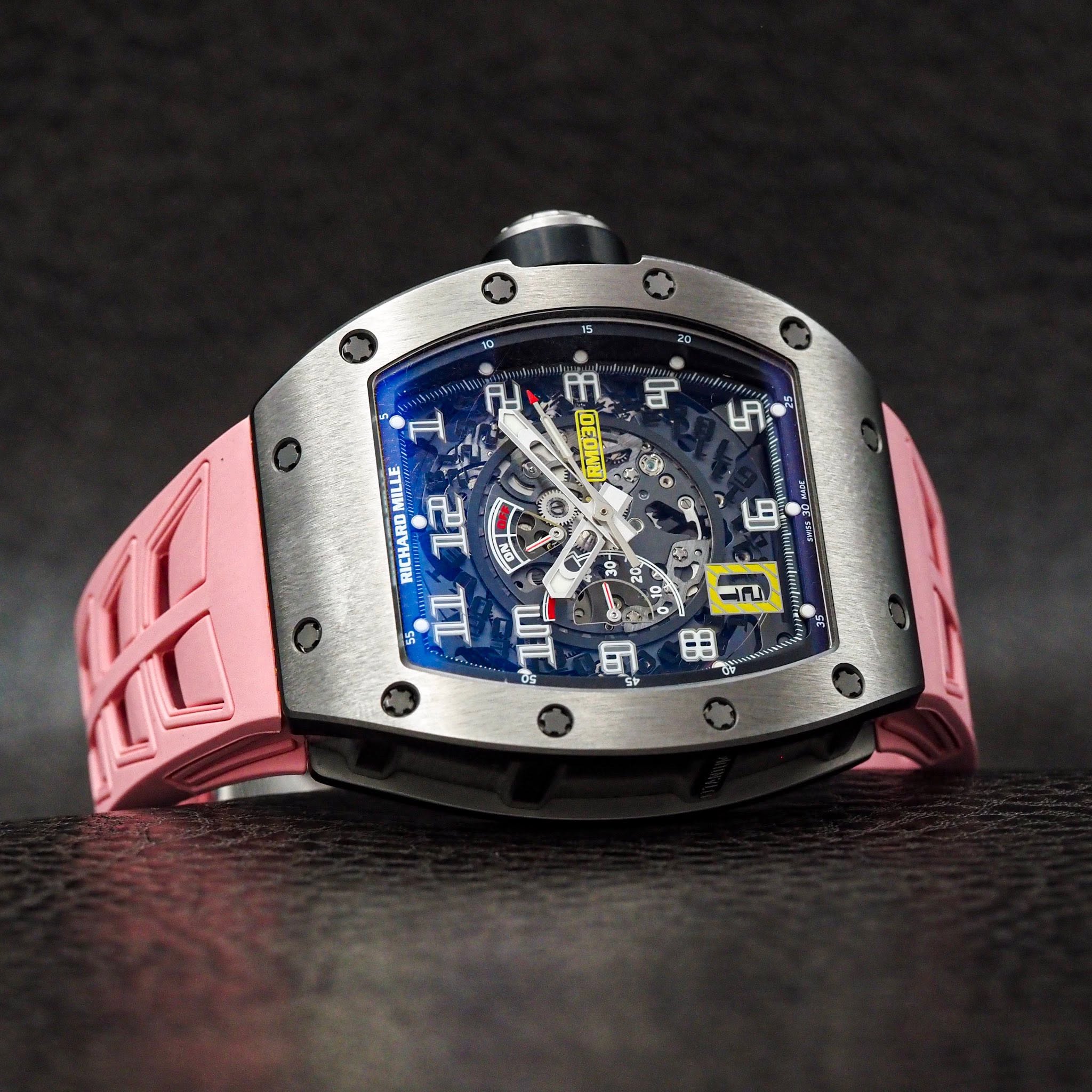 May be an image of wrist watch and text