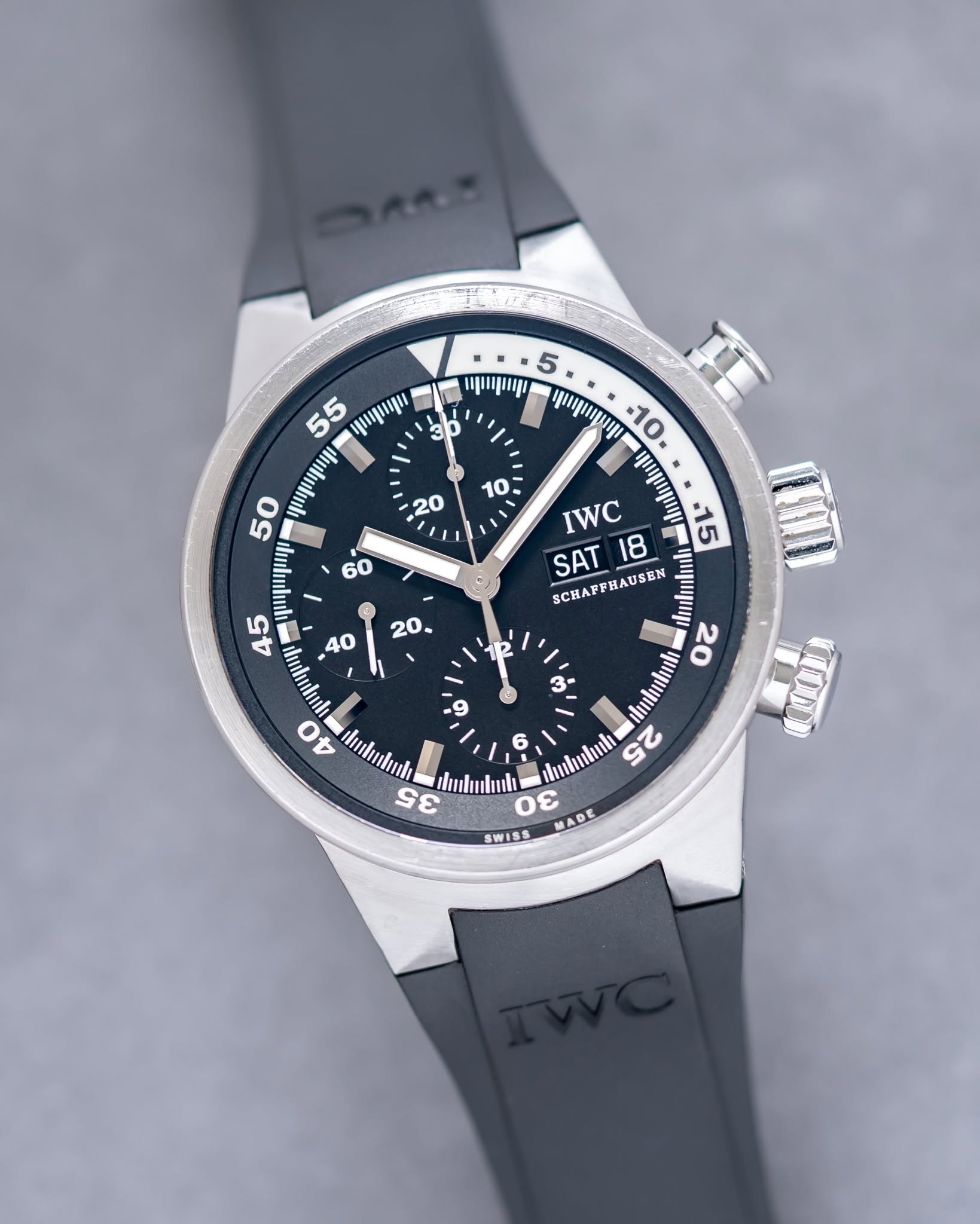 May be an image of wrist watch and text