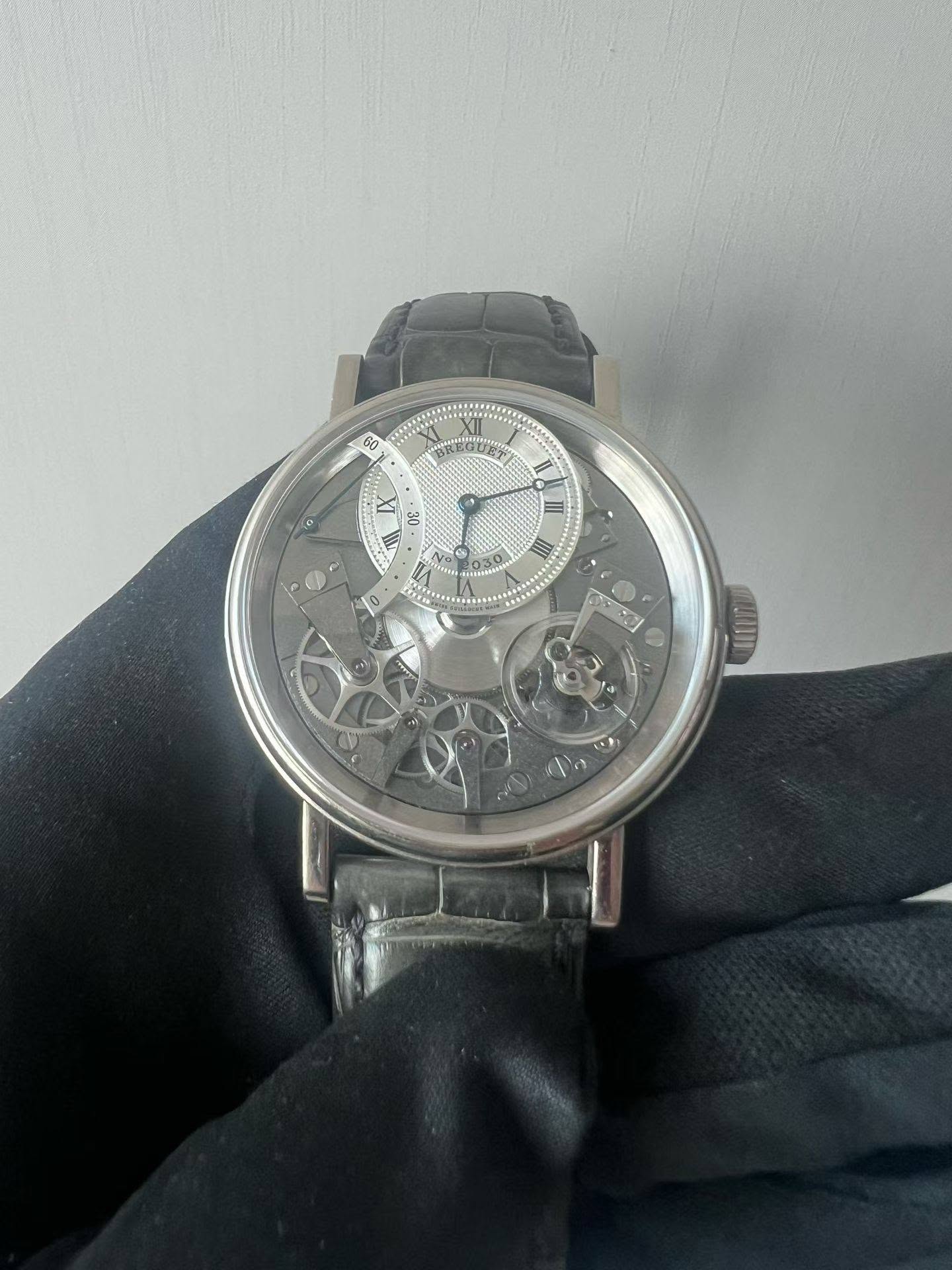 May be an image of wrist watch