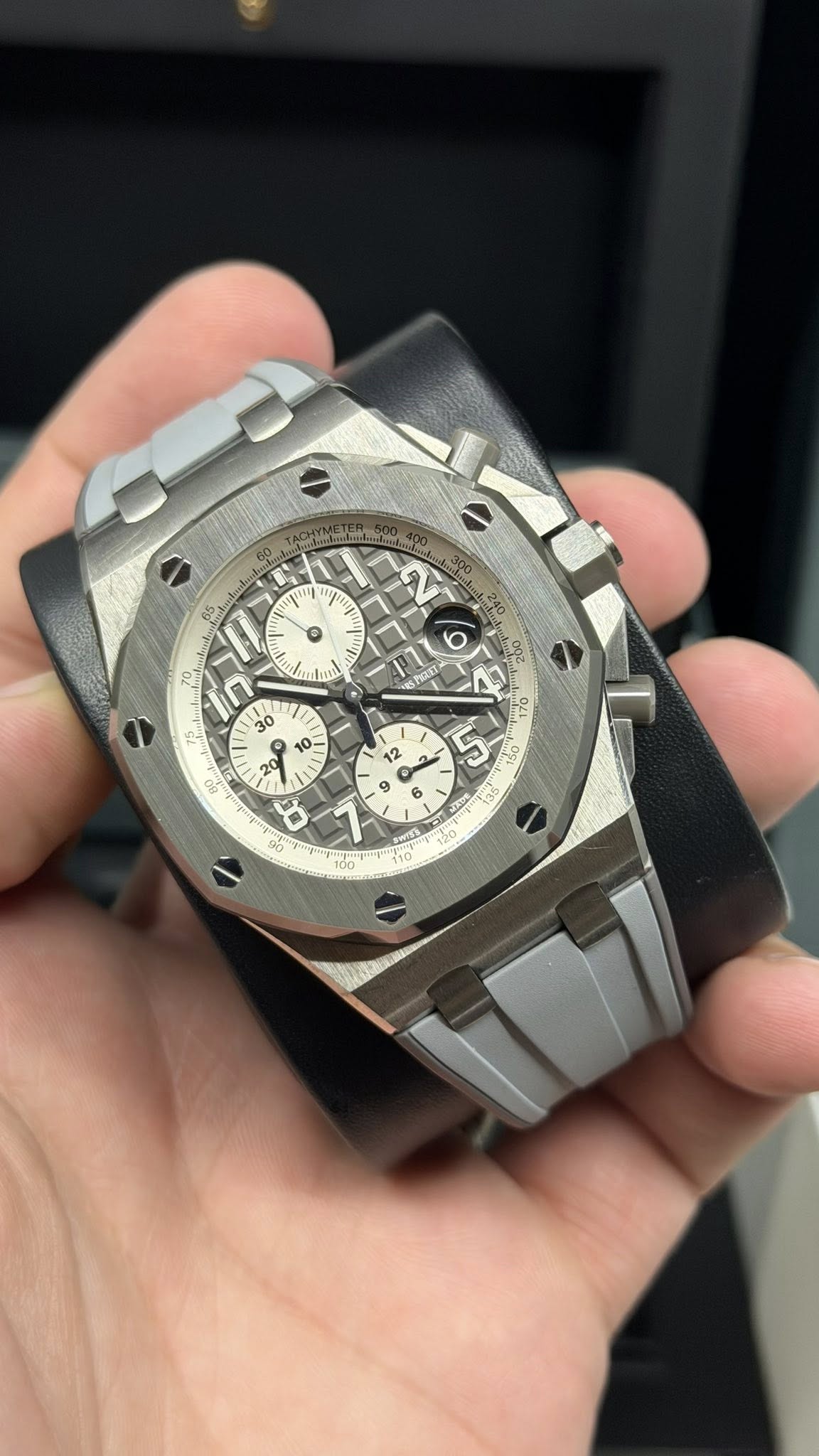 May be an image of wrist watch and text