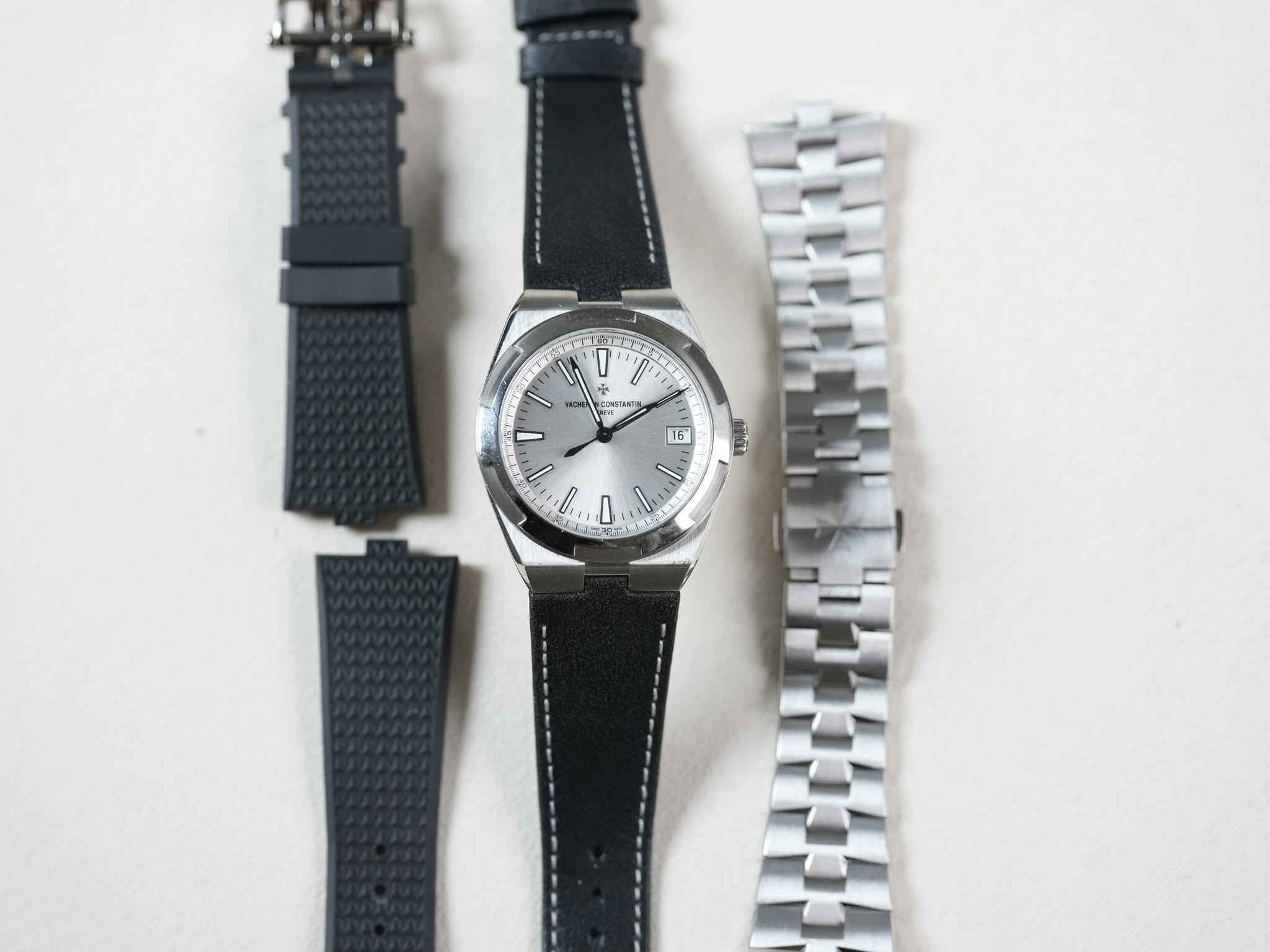 May be an image of wrist watch and text