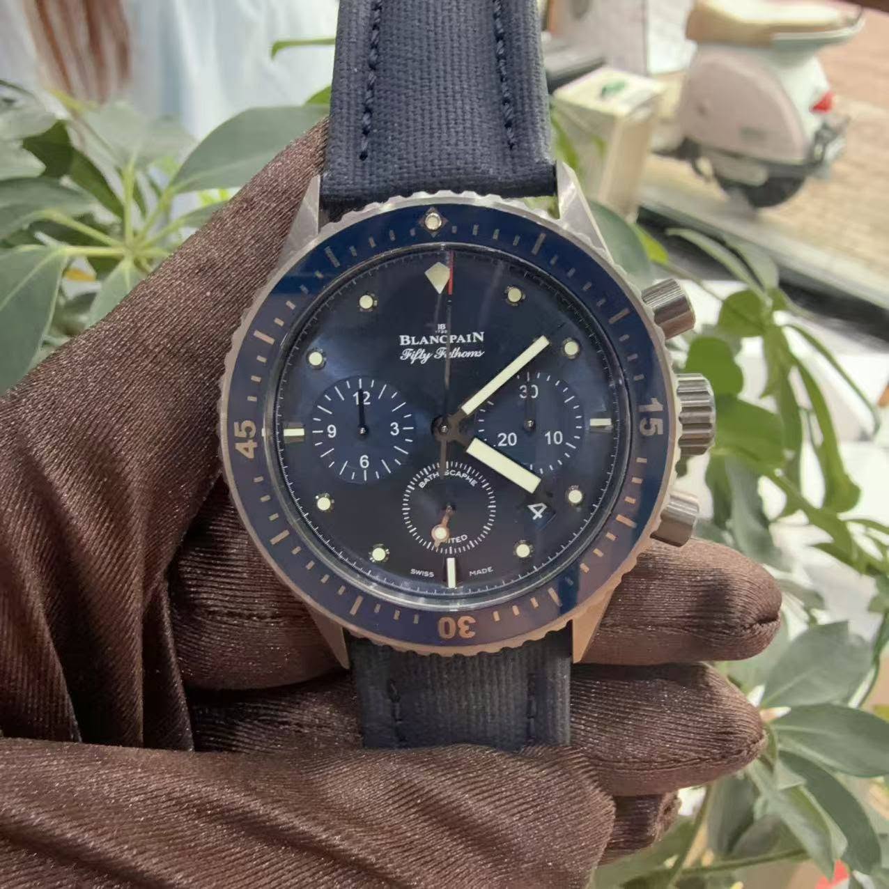 May be an image of wrist watch and text