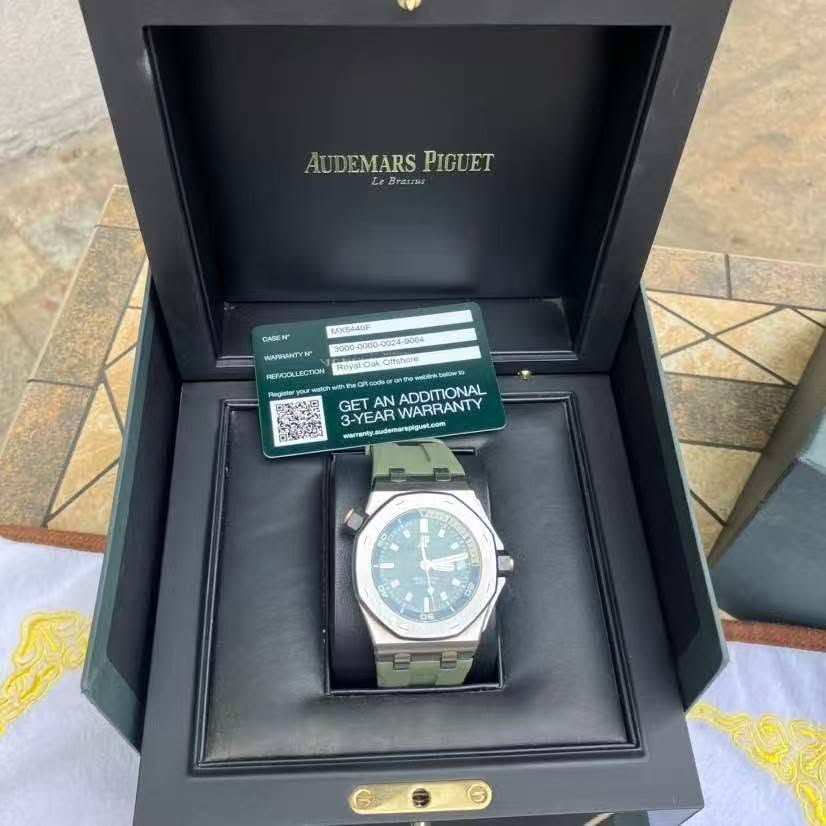 May be an image of wrist watch and text that says 'AUDEMARS AUDEMARSPIGUET PIGUET Brasws Brtsis ل CADEN MX544U7 IBFRIOLLECTION 2 GET 3-YEAR 3-YEARWARRANTY AN ADDITIONAL…