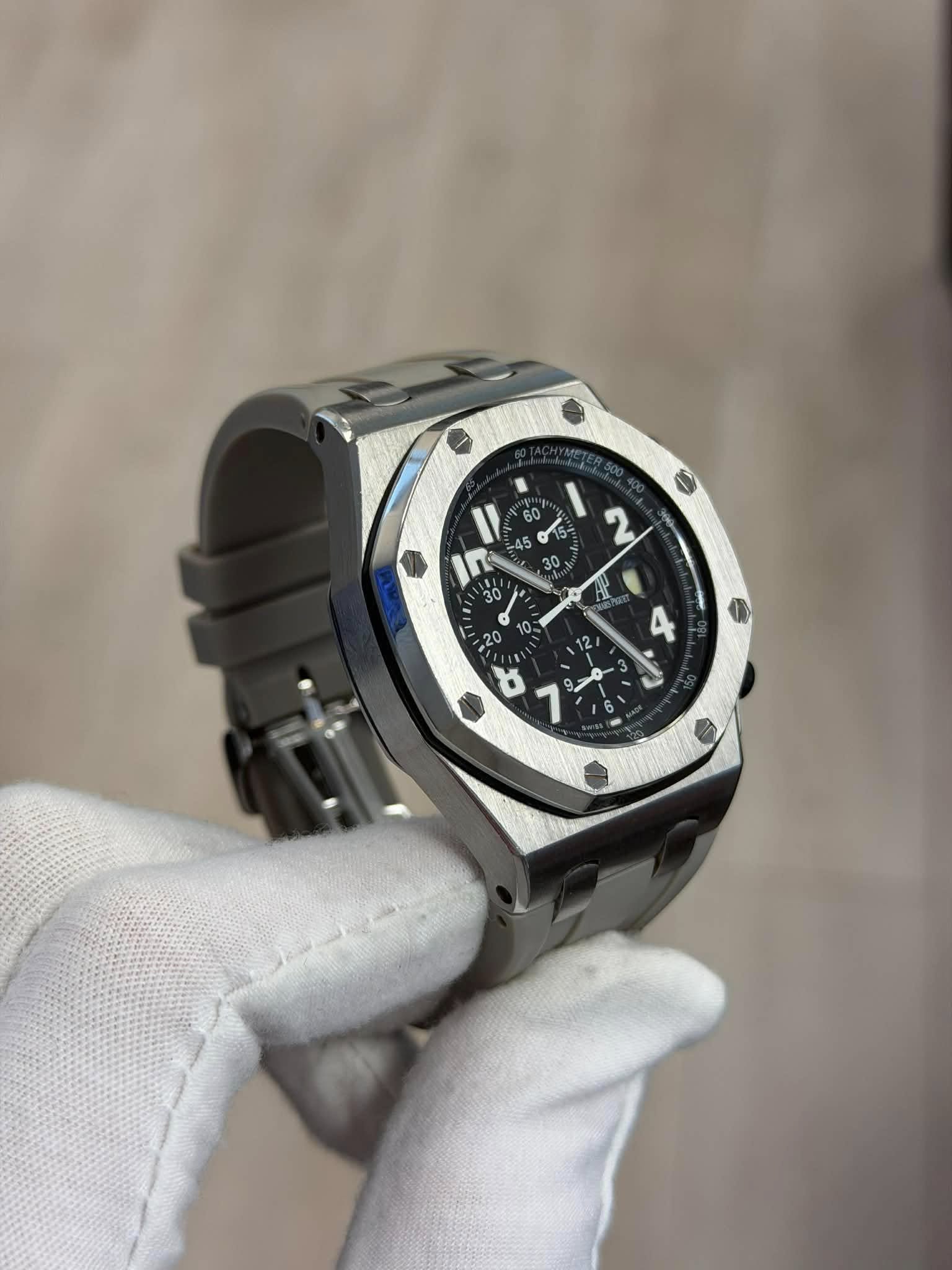May be an image of wrist watch and text