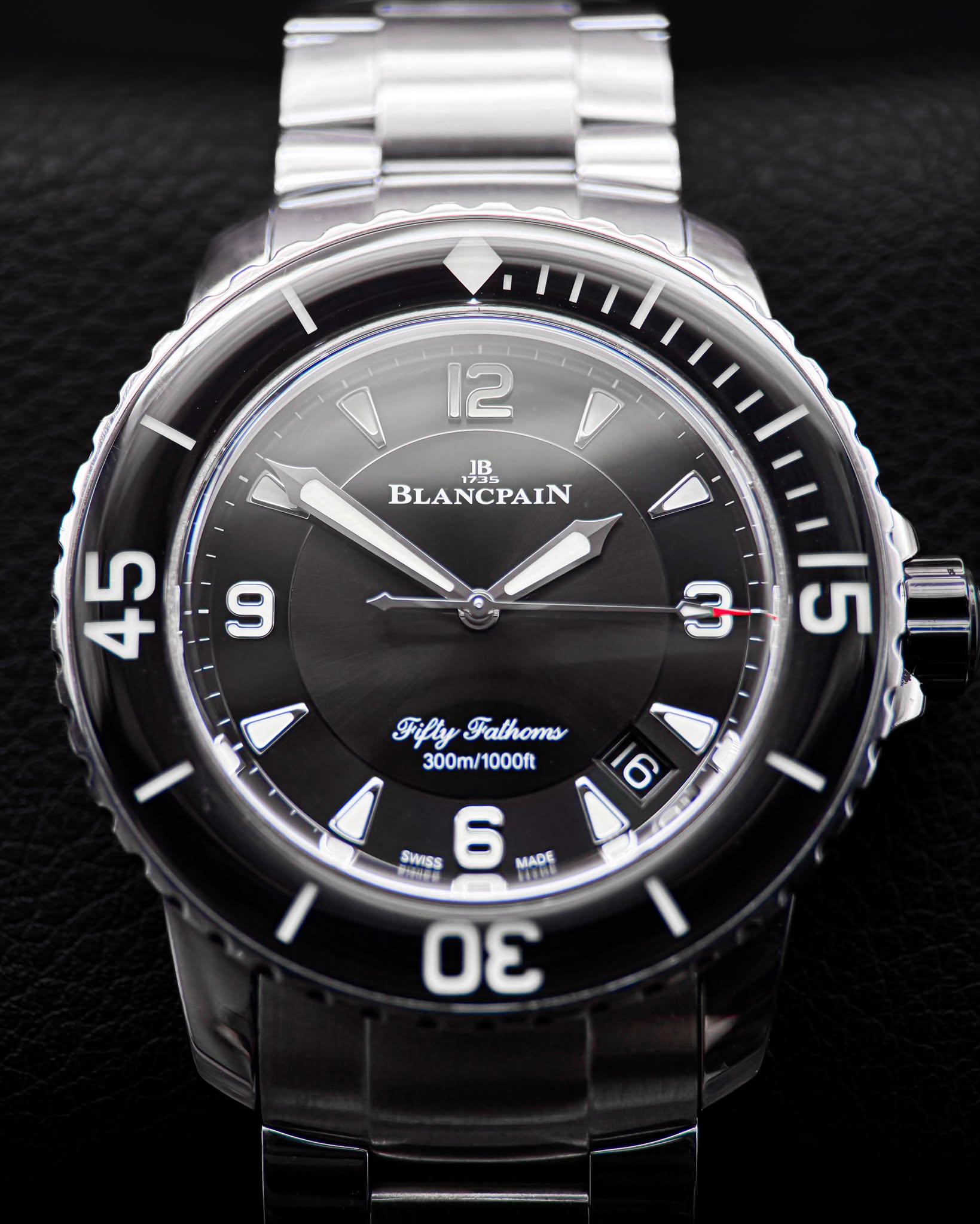 May be an image of wrist watch and text that says '۱ 12 ذ JB BLANCPAIN FiflyFalhoms Fathoms 300m/1000ft 6 SWISS 6 YOU ALBE MADE aлoHO σε'
