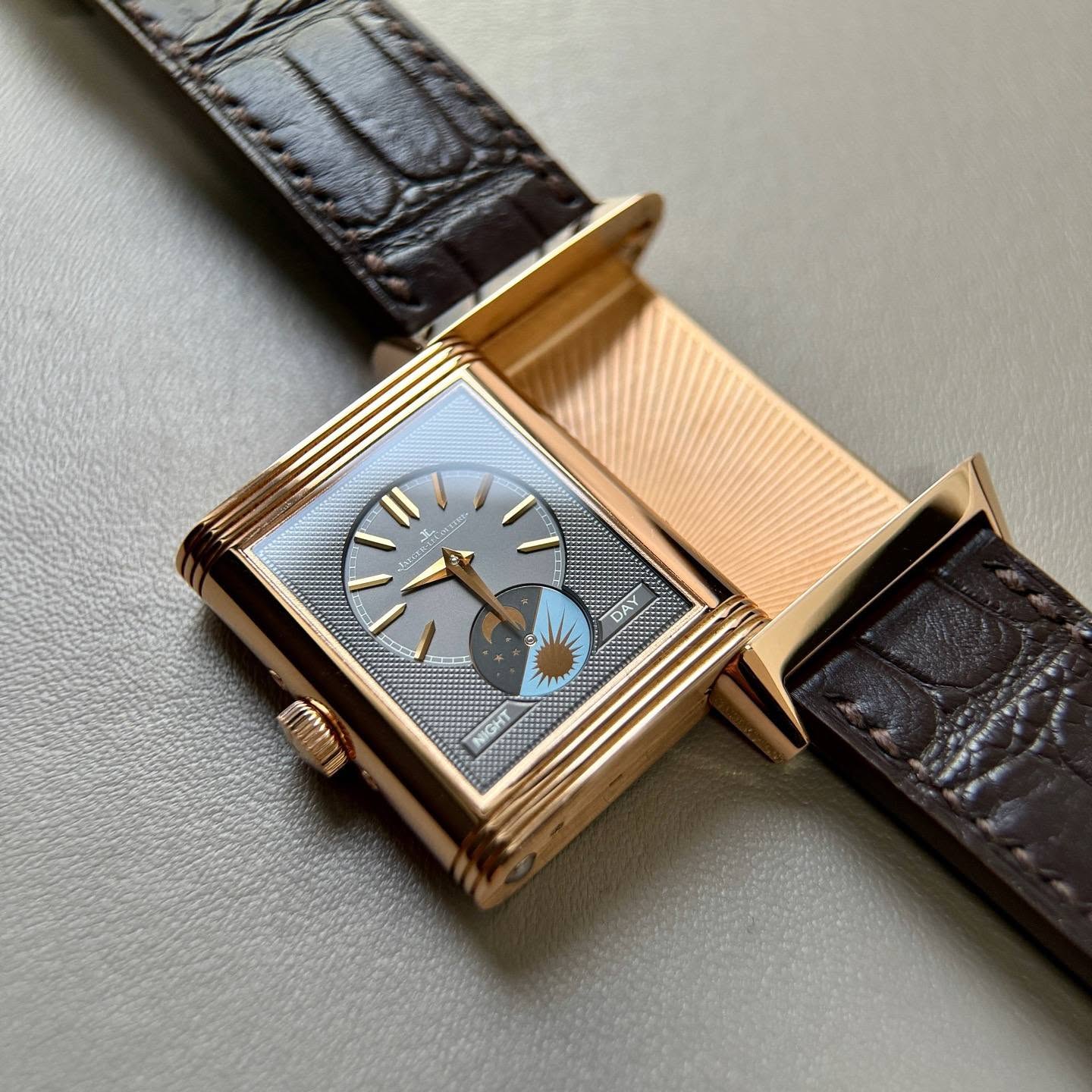 May be an image of wrist watch and text