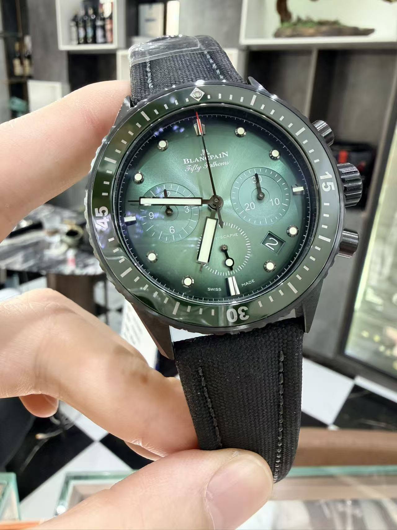 May be an image of wrist watch and text