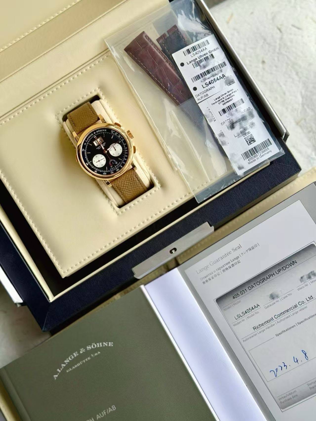 May be an image of wrist watch and text
