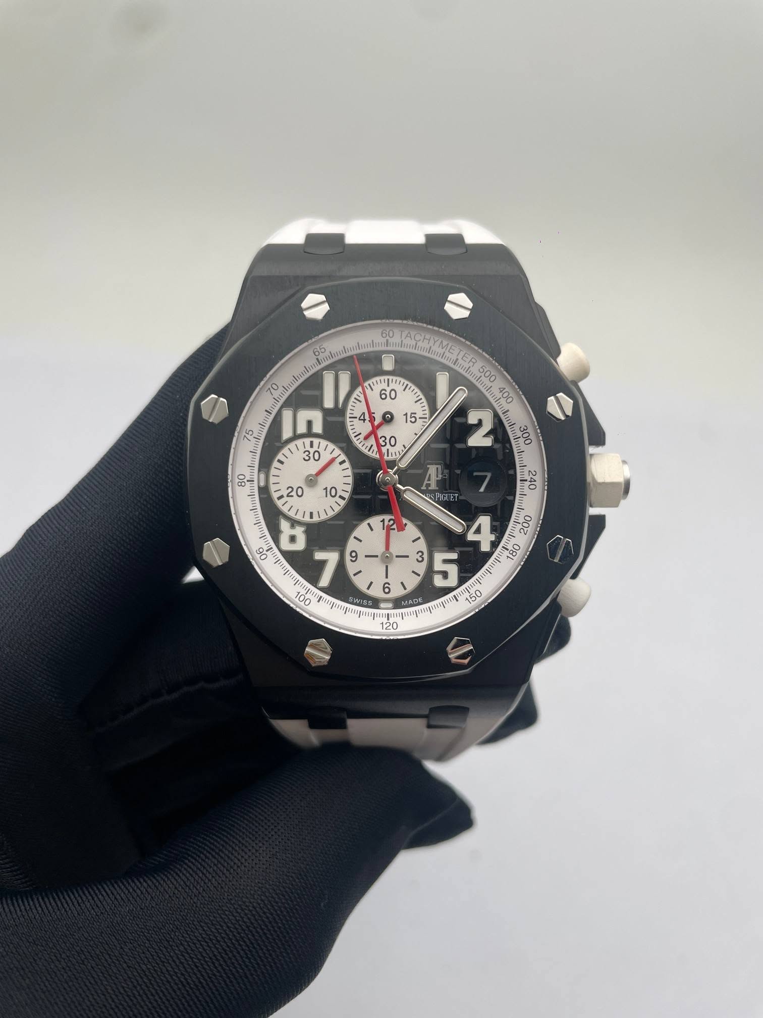 May be an image of wrist watch and text