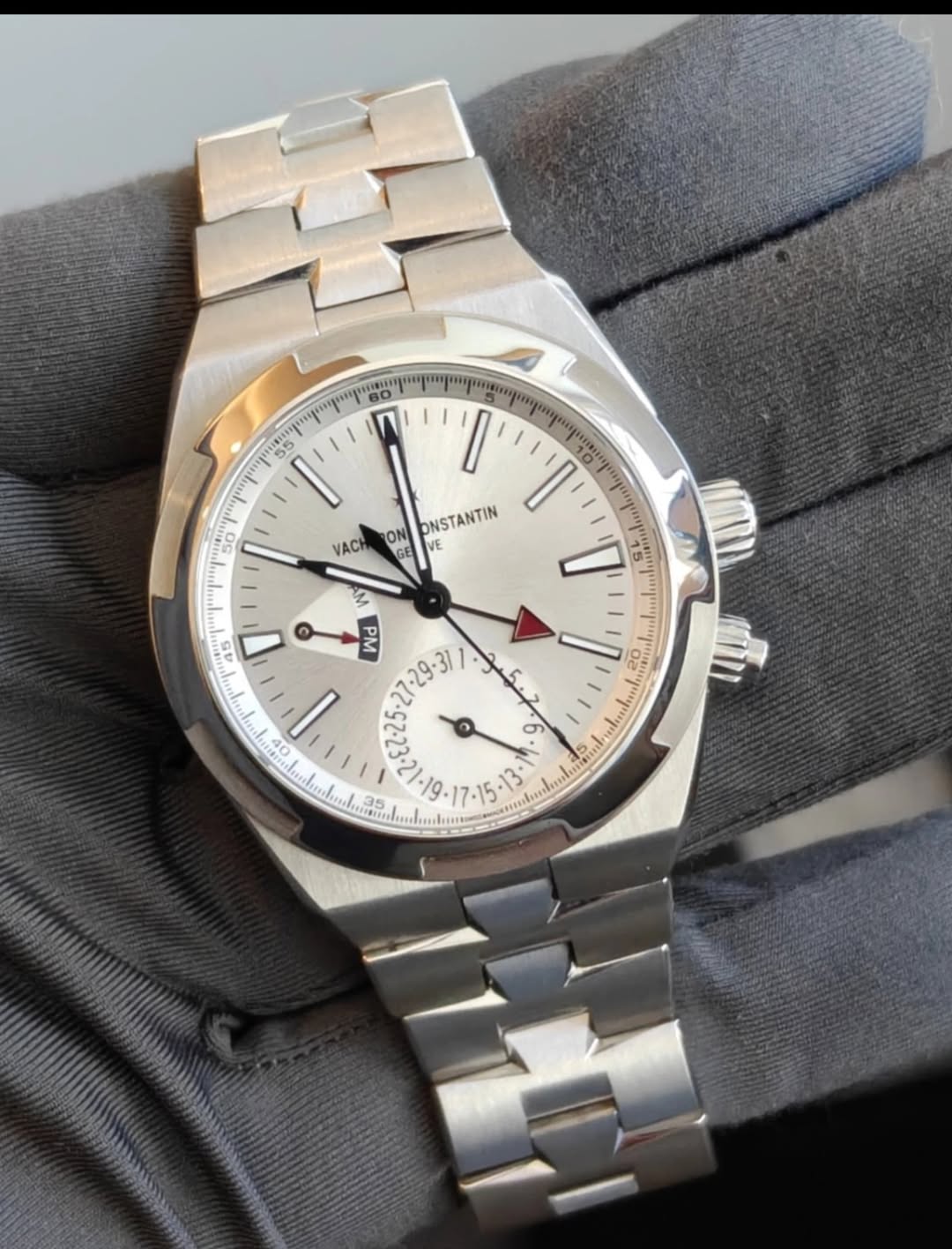May be an image of wrist watch and text
