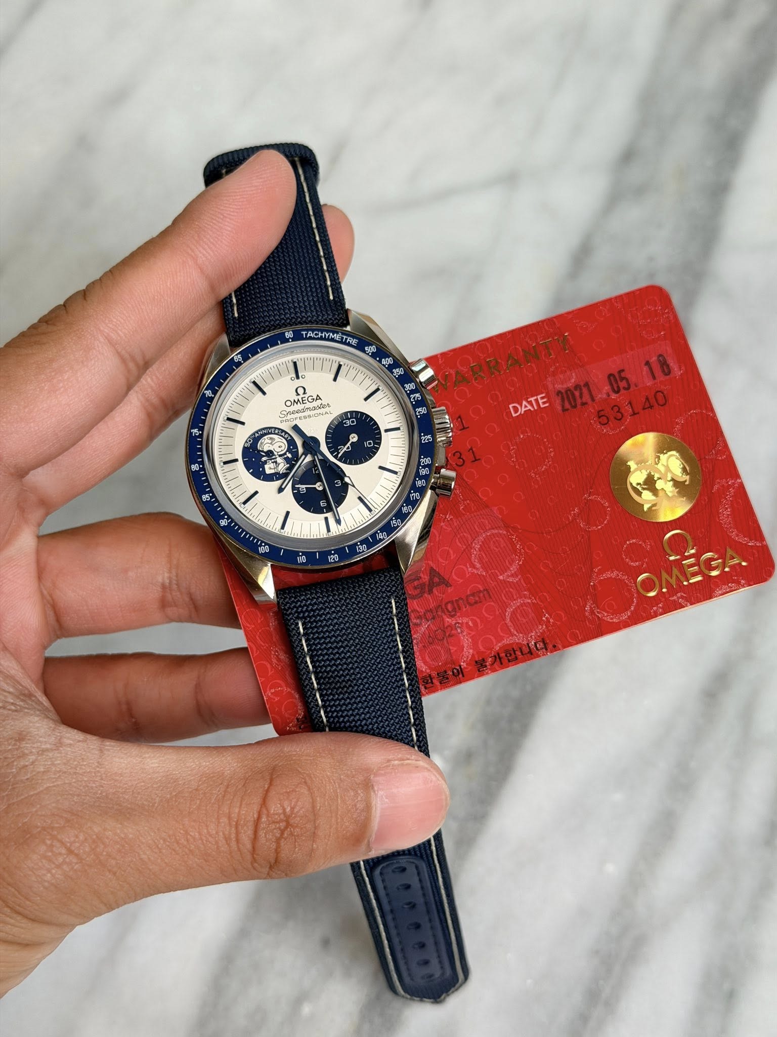 May be an image of wrist watch and text that says 'OMEGA SMie Cecesinases ea OMEGA Σε 구 0 や TaCHyMET RE ្ង 年 WARR ARRANTY DATE AИTи E 31 魚品 E 20 10 분가합니다.'