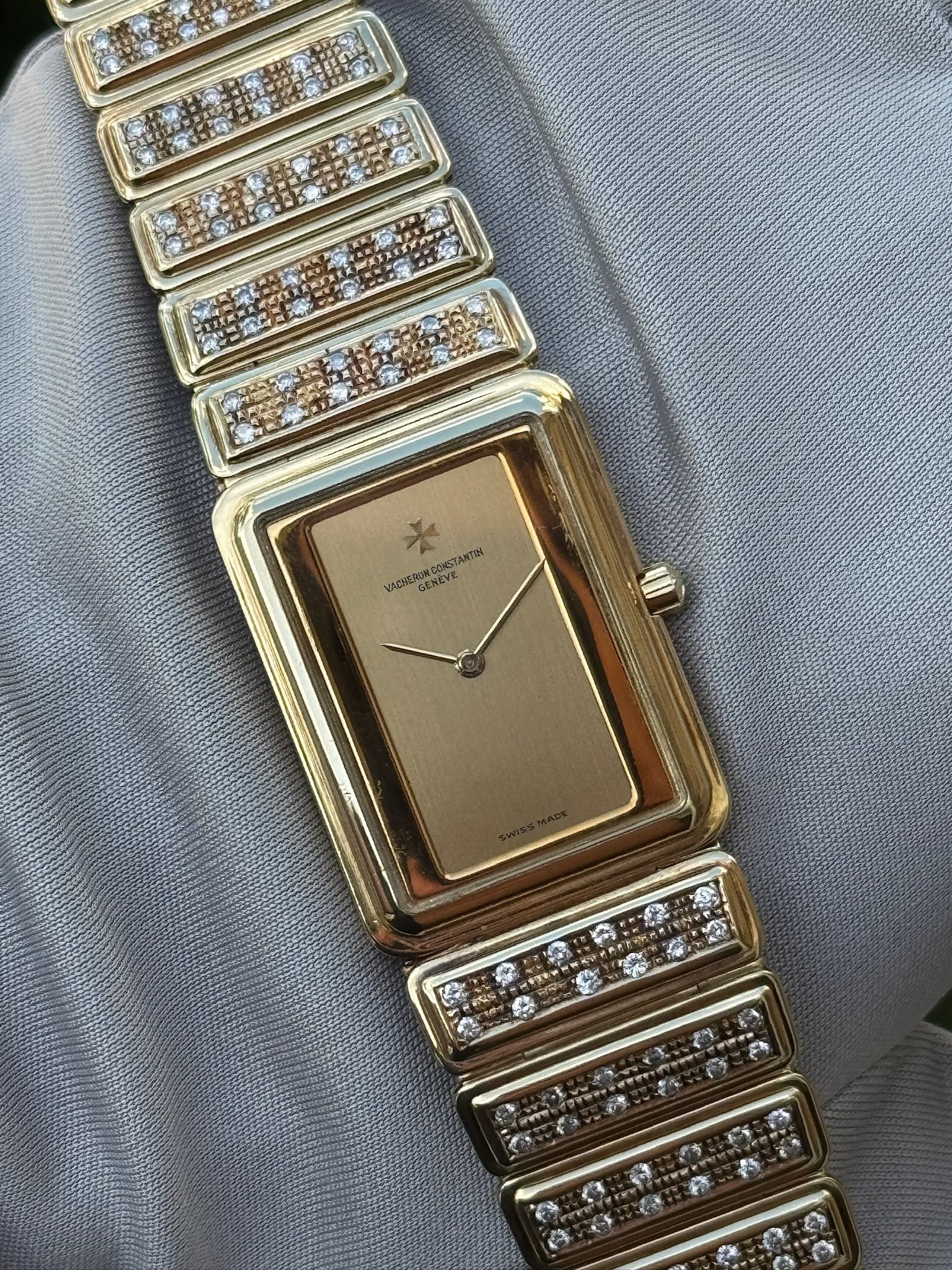 May be an image of wrist watch, jewelry and text