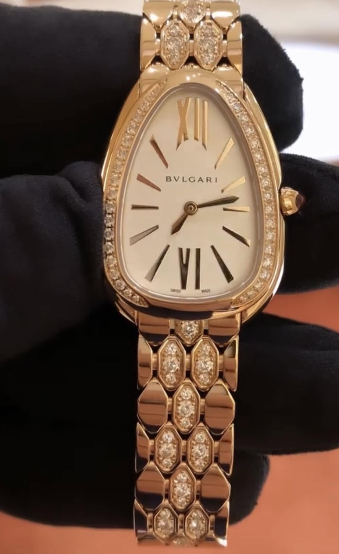 May be an image of wrist watch, jewelry and text
