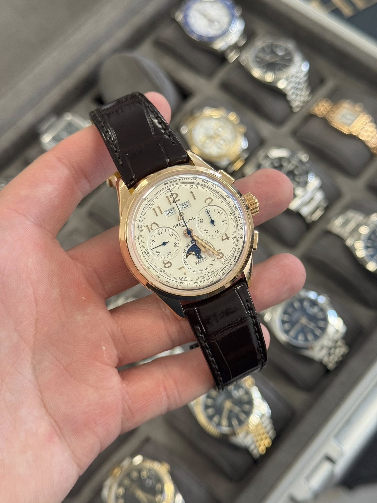 May be an image of wrist watch and text