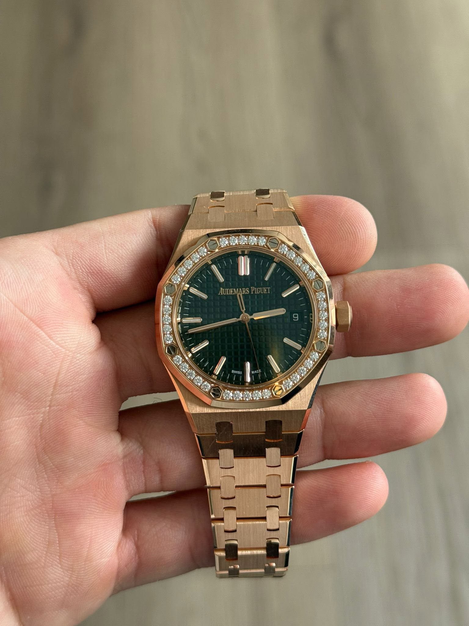 May be an image of wrist watch and text