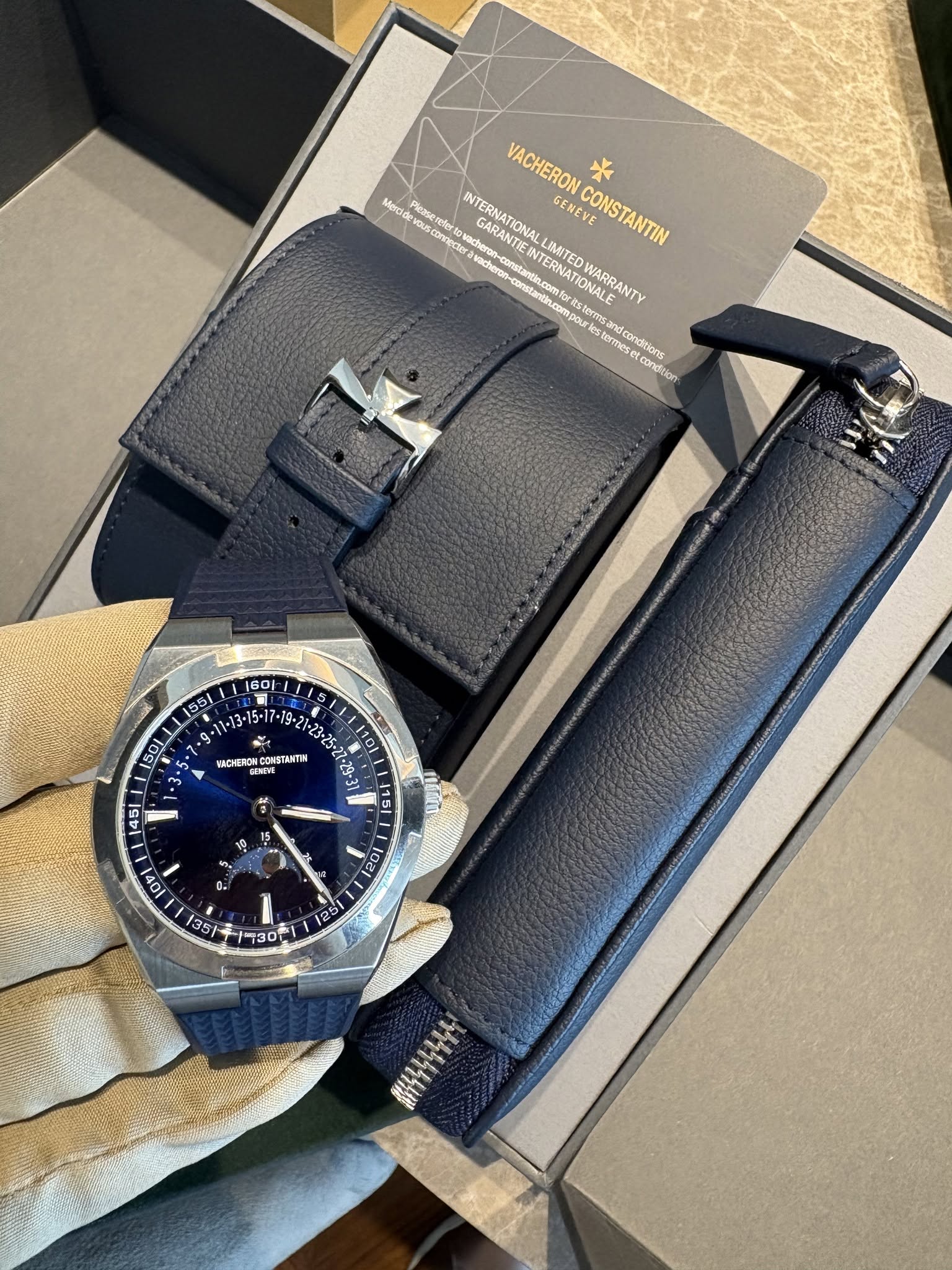 May be an image of wrist watch and text