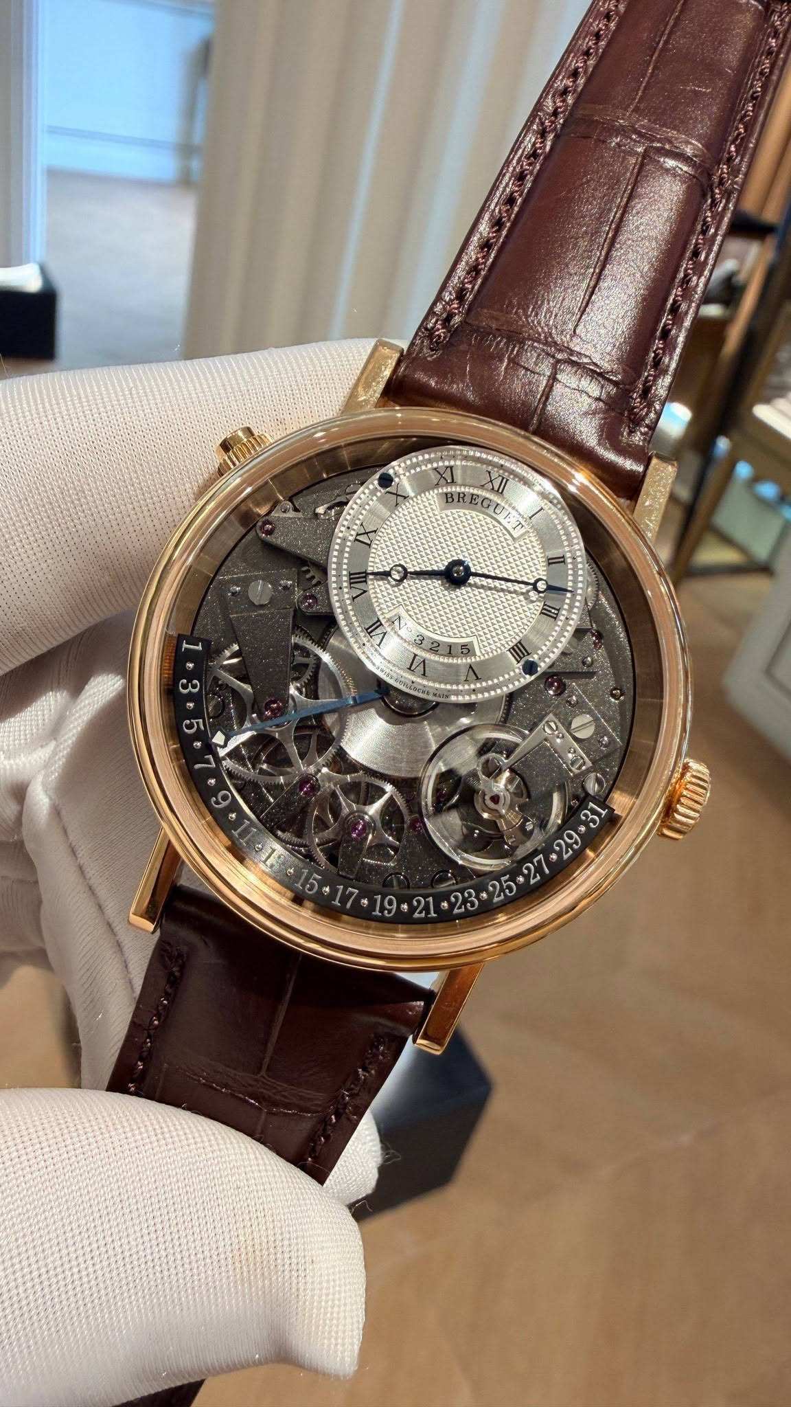 May be an image of wrist watch and text