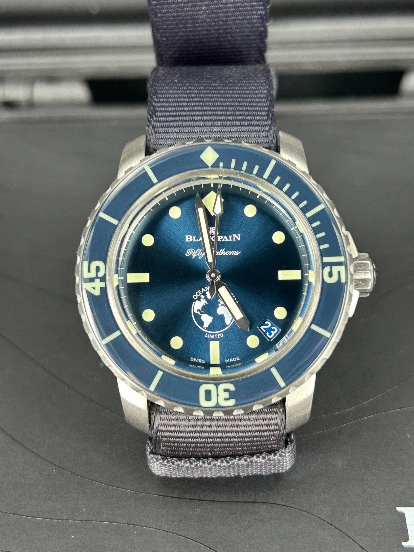 May be an image of wrist watch and text that says 'AL 週 周 PAIN BL Fifly thoms 45 CEAM m R 15 LINITED 23 E ى SWISS MADE つめて 50'