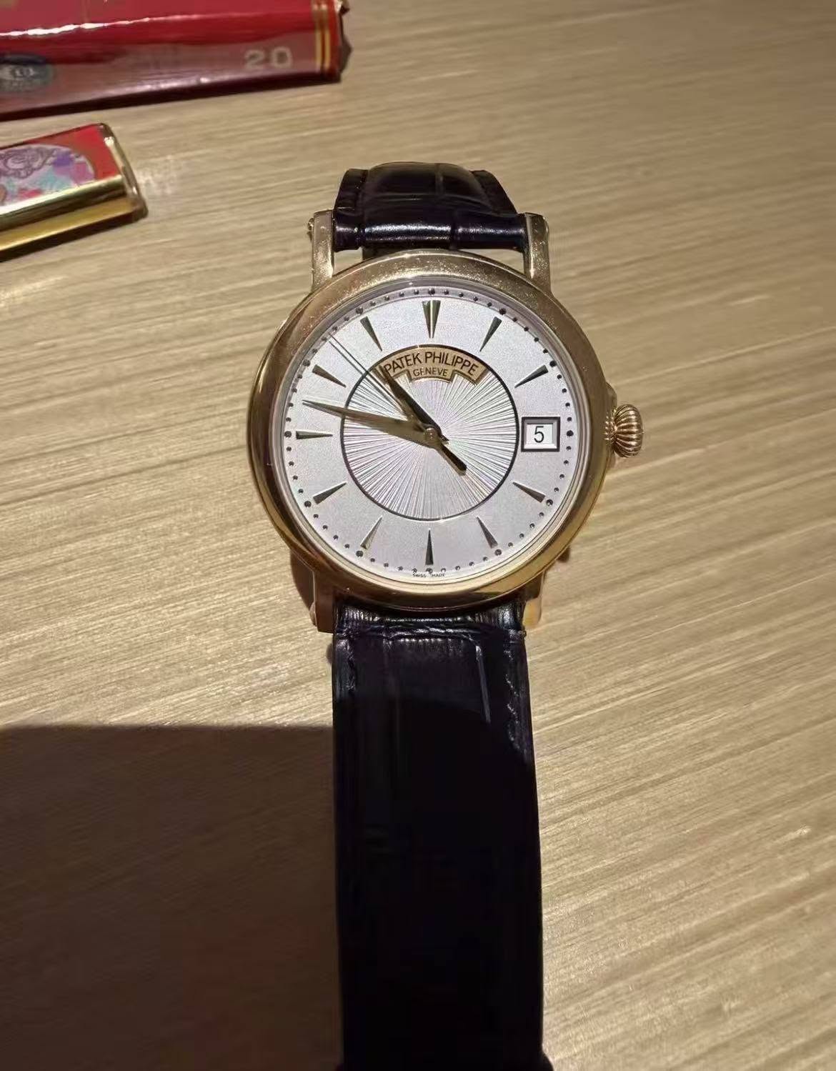 May be an image of wrist watch and text that says 'PΗUPE GFNEVE DATEK PATEKPHILIP NEVE PHILIPPE IPPE 1 5 1 1 شد EMRR VIE:'
