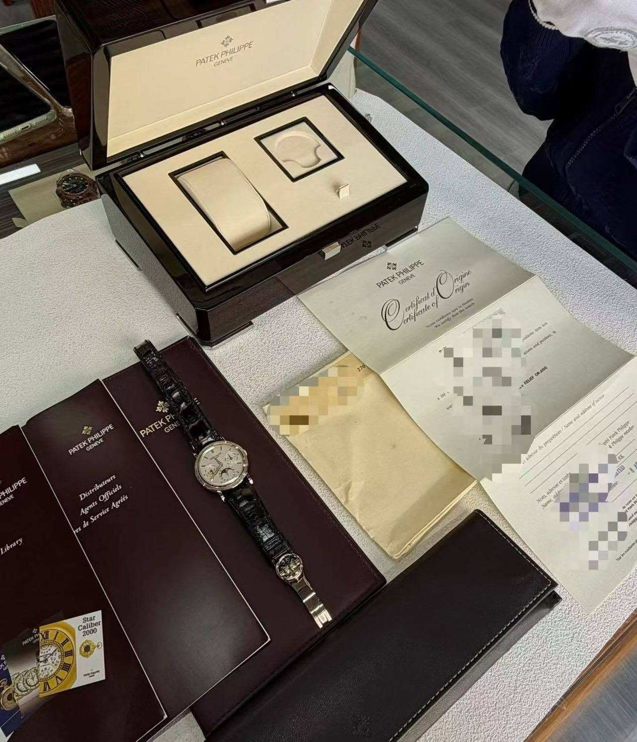 May be an image of wrist watch and text
