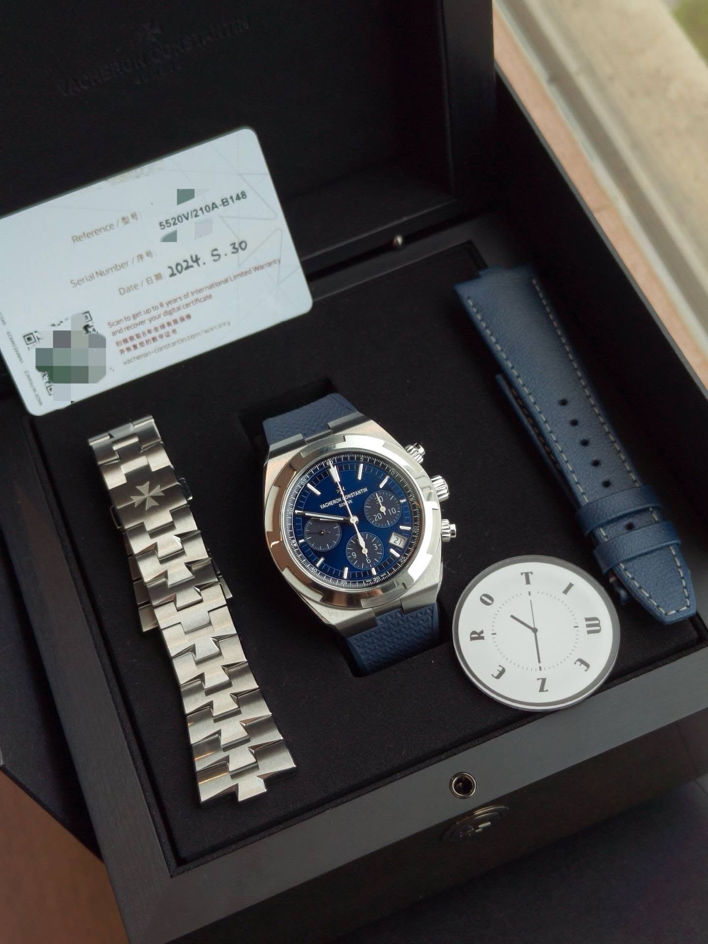 May be an image of wrist watch and text
