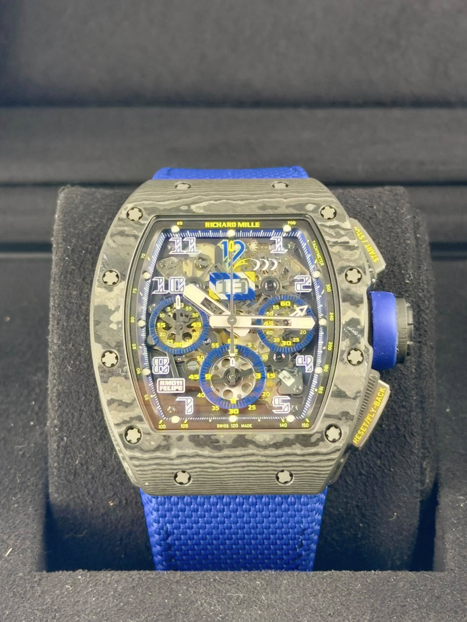 May be an image of wrist watch and text