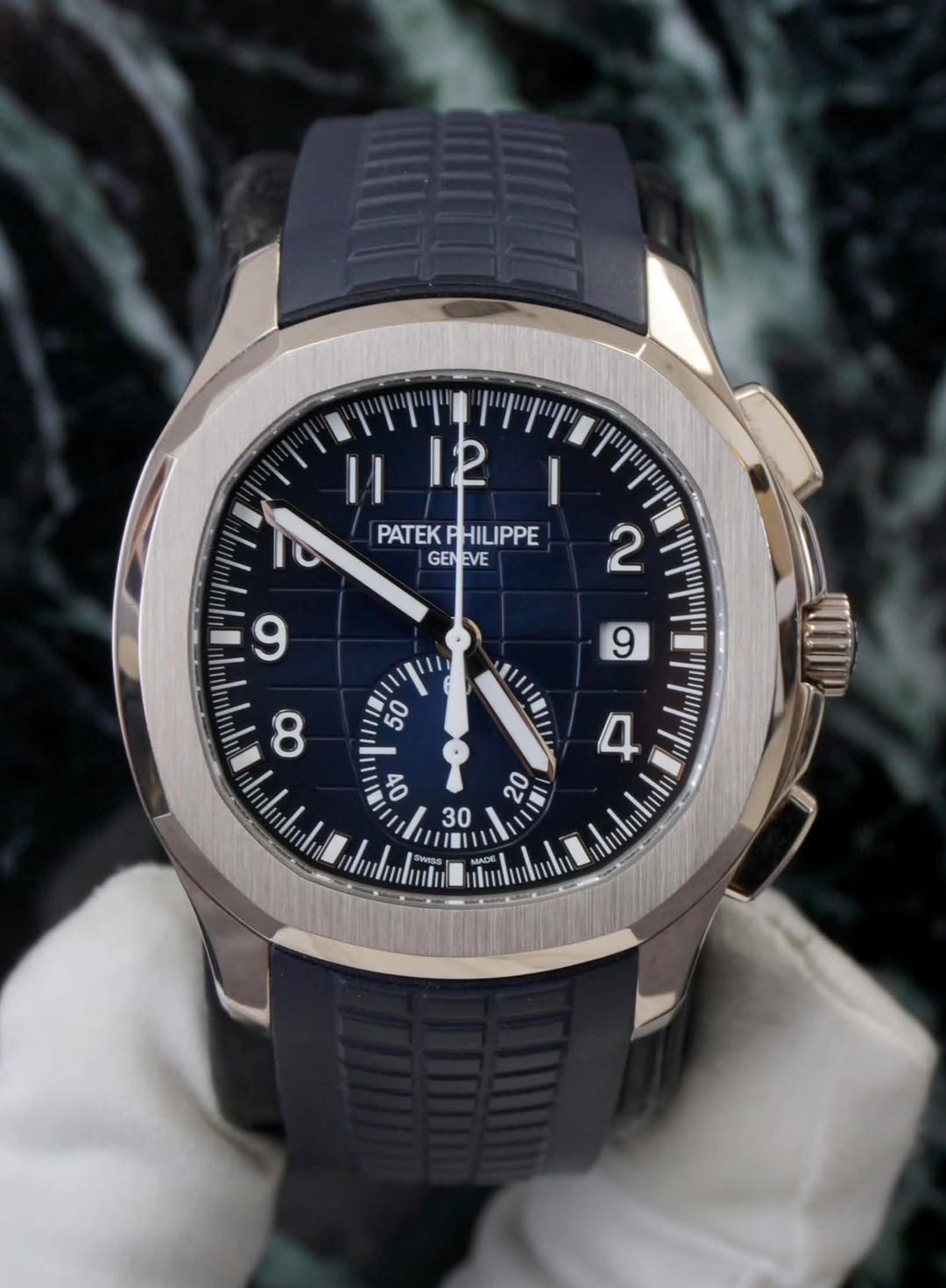 May be an image of wrist watch and text