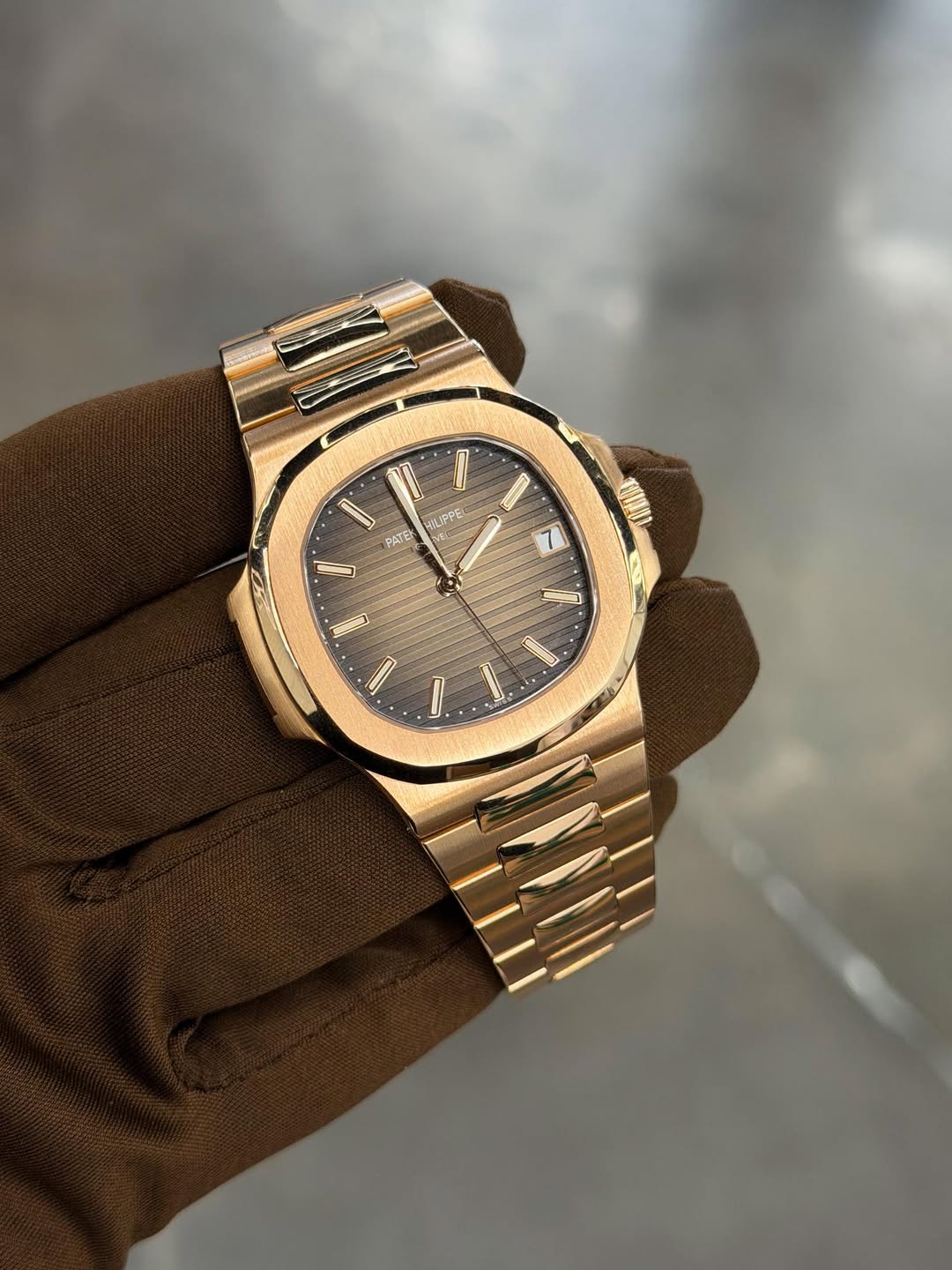 May be an image of wrist watch and text that says 'I l PATE HILIFPE PE U ሀ!! I I D. I'
