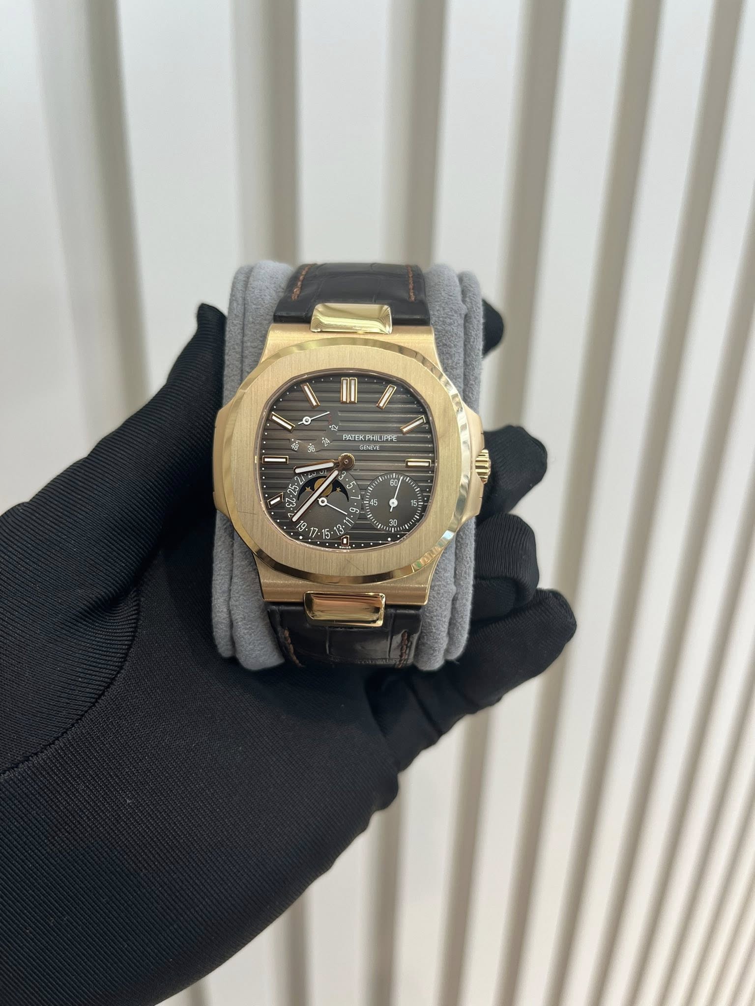 May be an image of wrist watch and text
