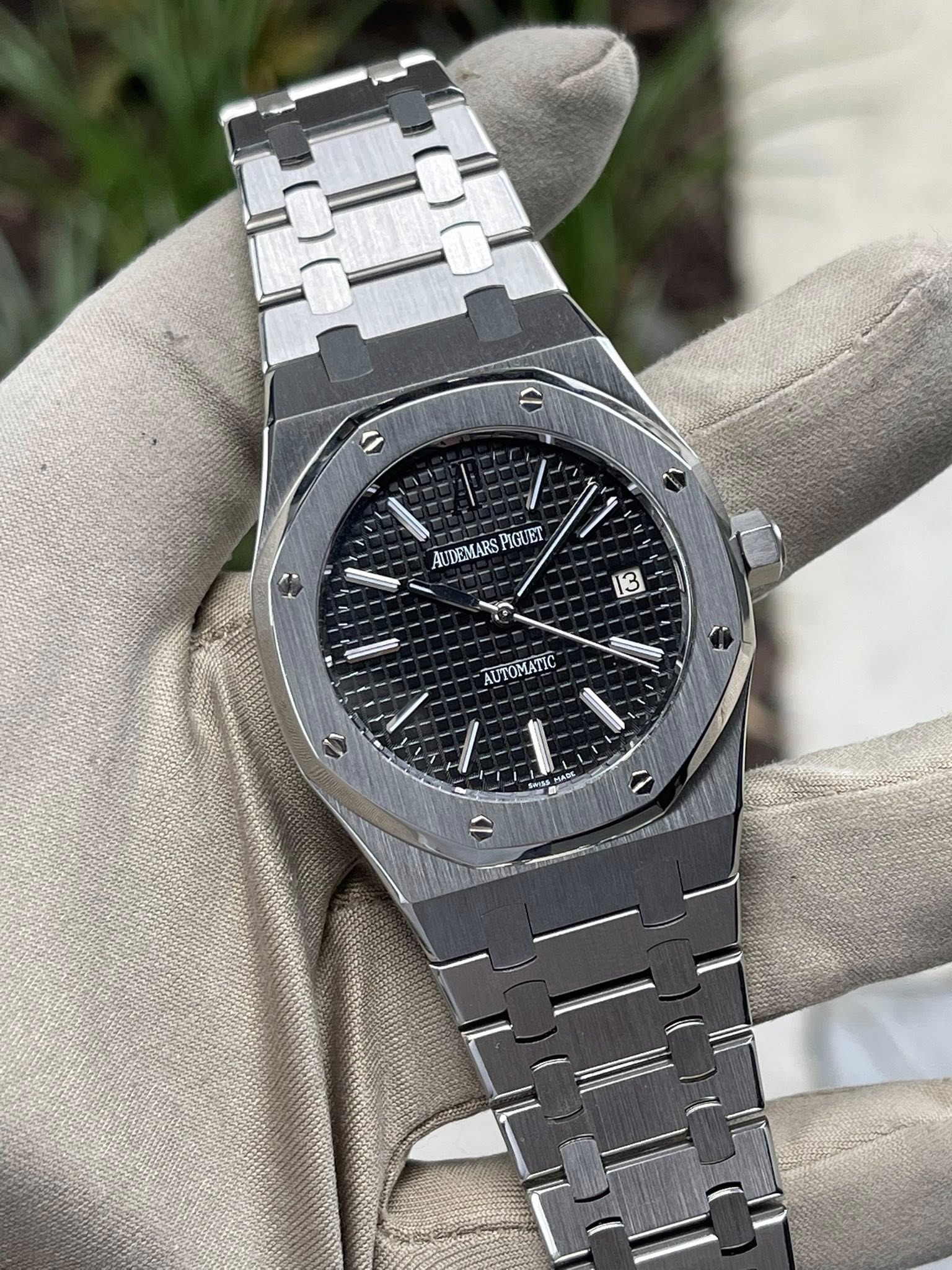 May be an image of wrist watch and text that says 'C I AUDEMARS AUDEMARSPIGUET PIG EX 11 PIGUET က AUTOMATIC K'