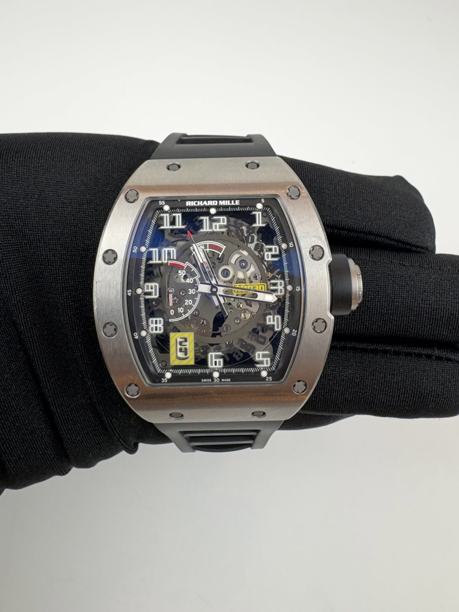May be an image of wrist watch and text